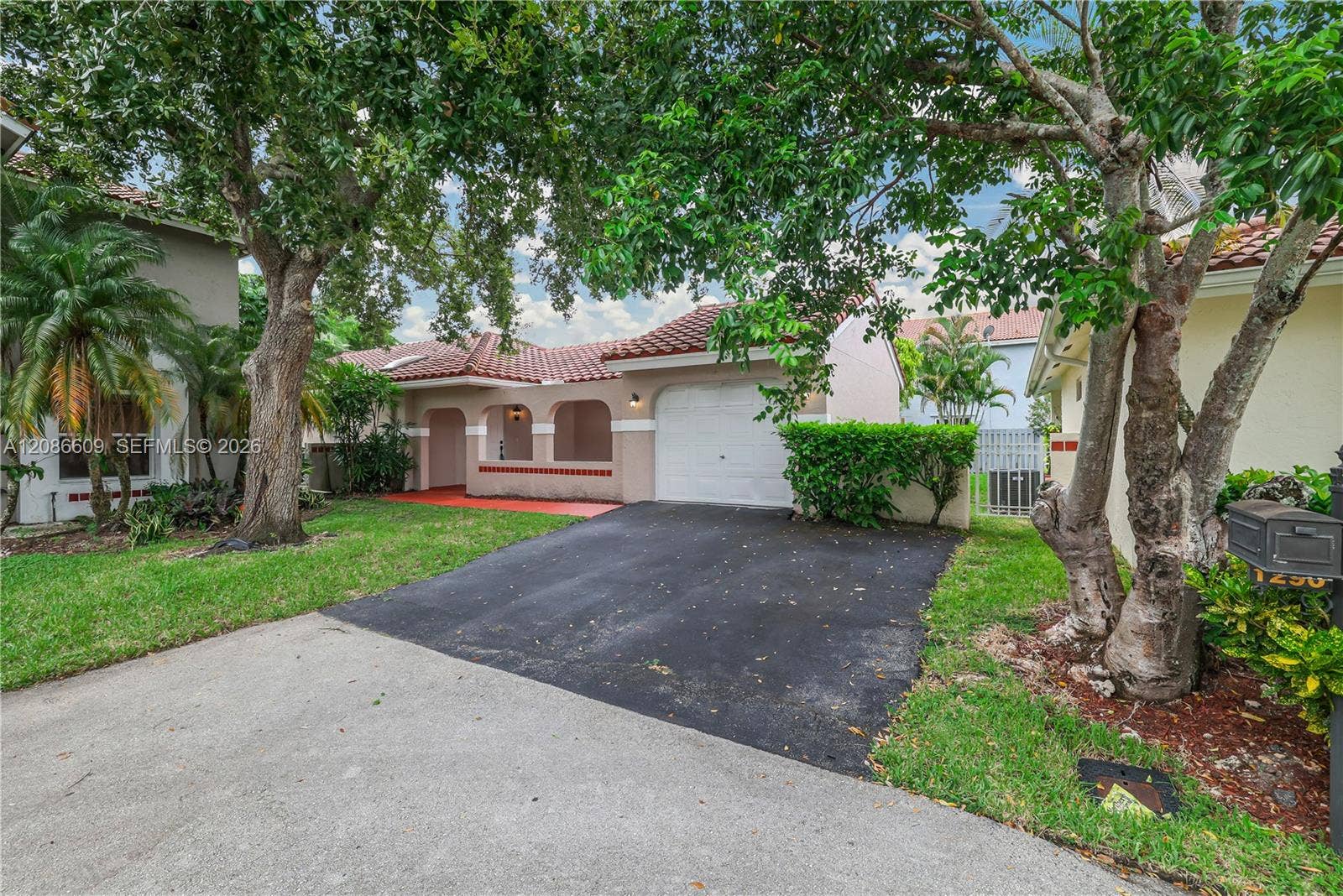 1290 Seagrape Circle, Weston, Weston, FL 33326 Beautiful floors and impact glass windows and doors.