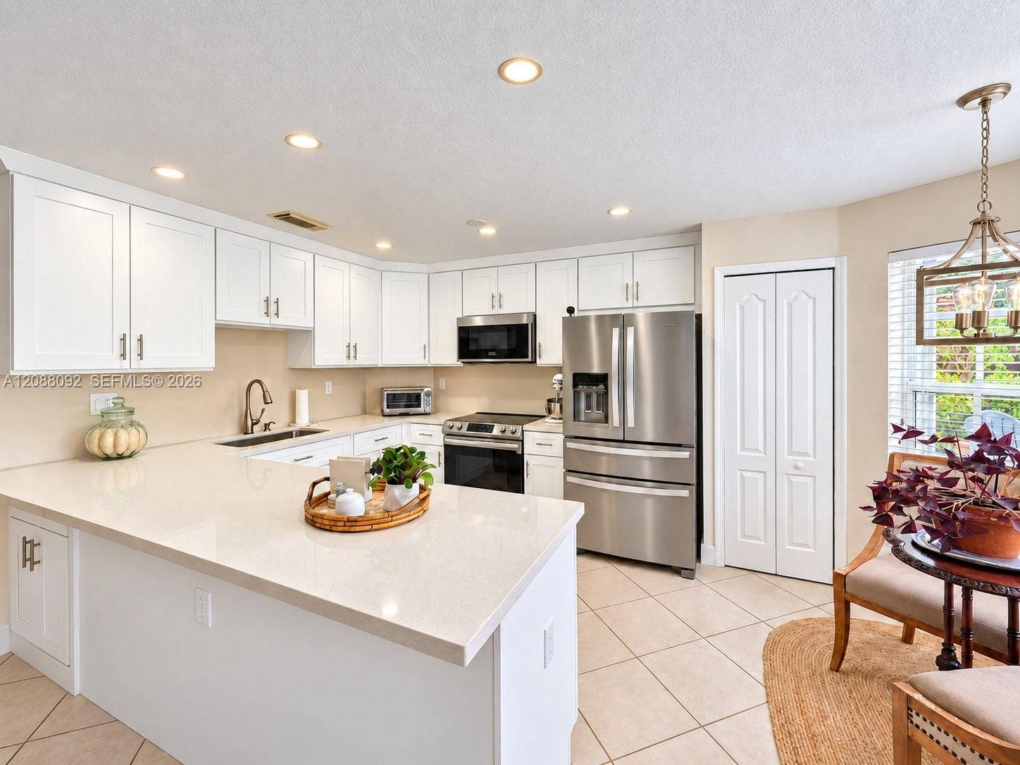 Pantry and breakfast nook with garden views.