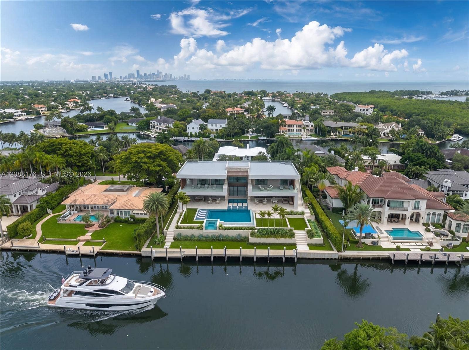 Designed for those who understand that waterfront and true boating access are two very different luxuries.*Virtual staging inspired by Ramon Pachecos architectural renderings for the proposed residence. The property is offered with approved, shovel-ready plans.