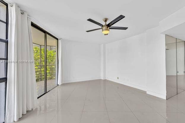 20400 W Country Club Drive, #315, Aventura, FL 33180 LIVING ROOM - ENTRANCE TO BALCONY