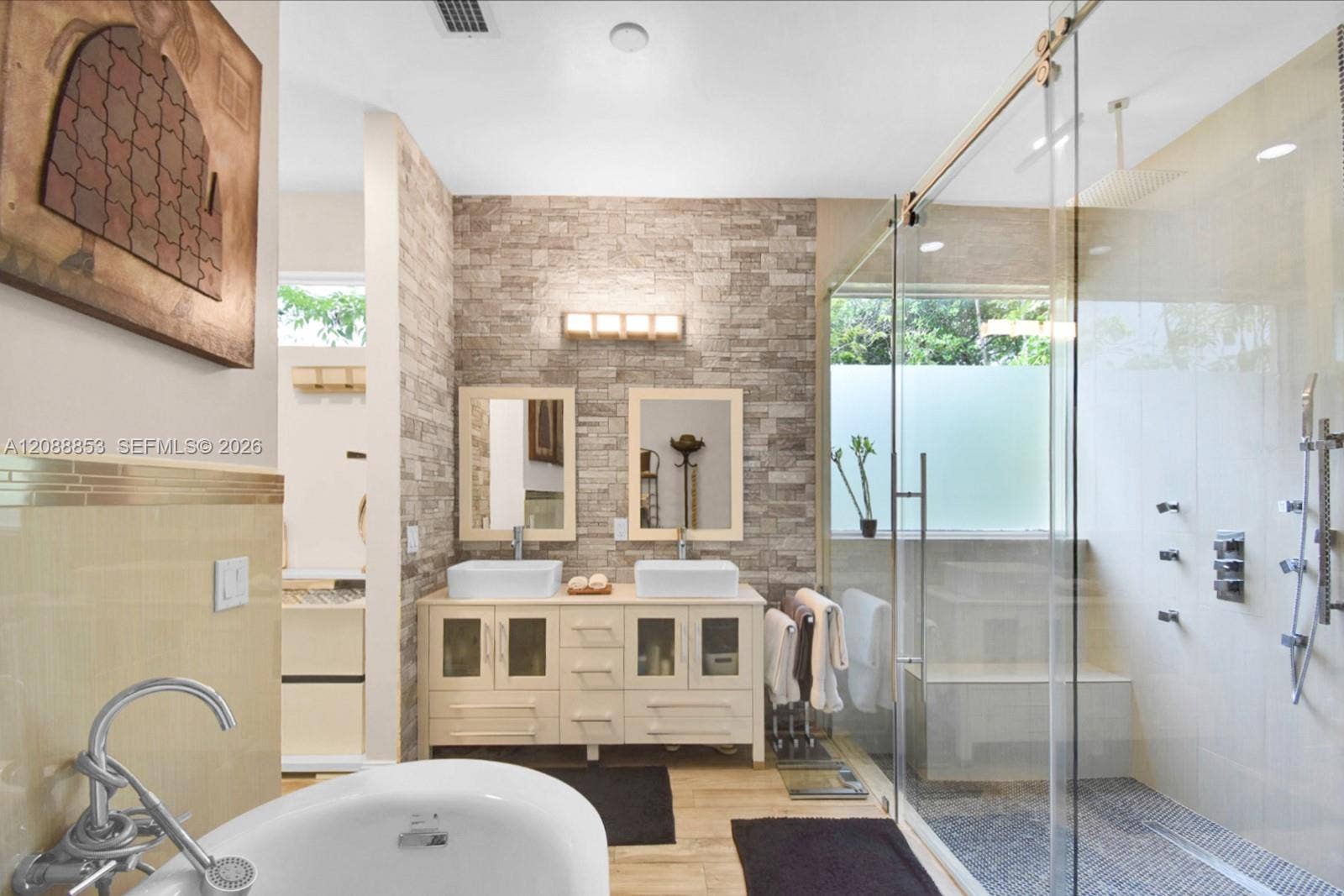 523 Stonemont Drive, Weston, FL 33326 Fully updated primary bathroom with modern finishes