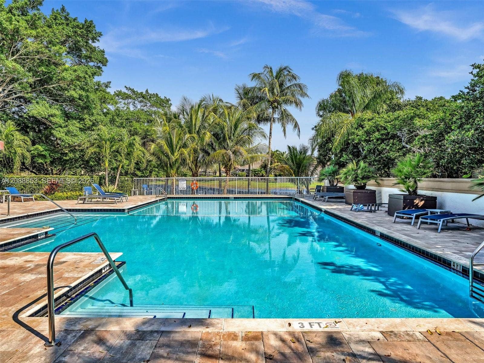 523 Stonemont Drive, Weston, FL 33326 Heated community pool overlooking the lake