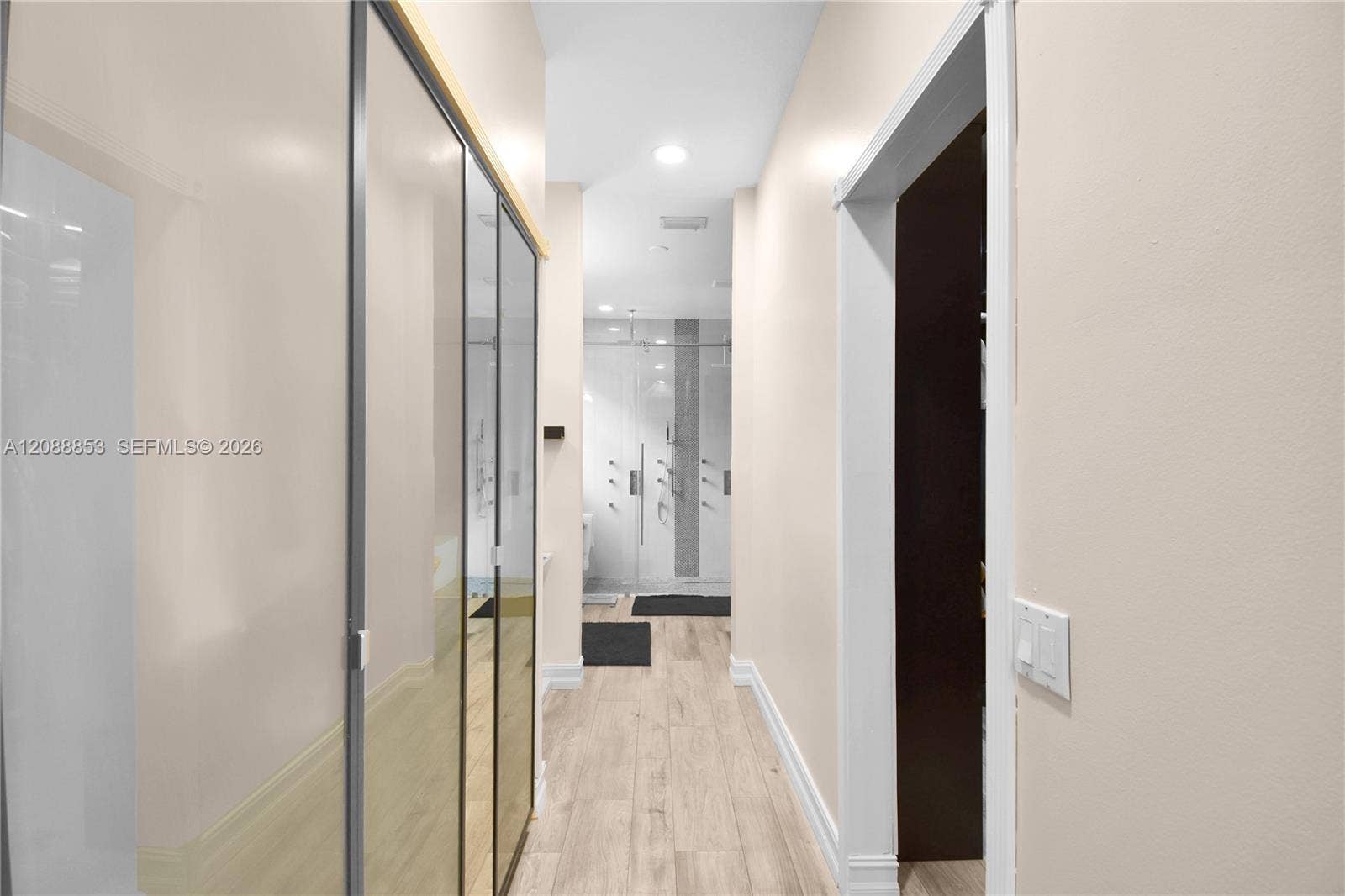 523 Stonemont Drive, Weston, FL 33326 Custom His & Hers closets, a makeup vanity area leading to the primary bathroom