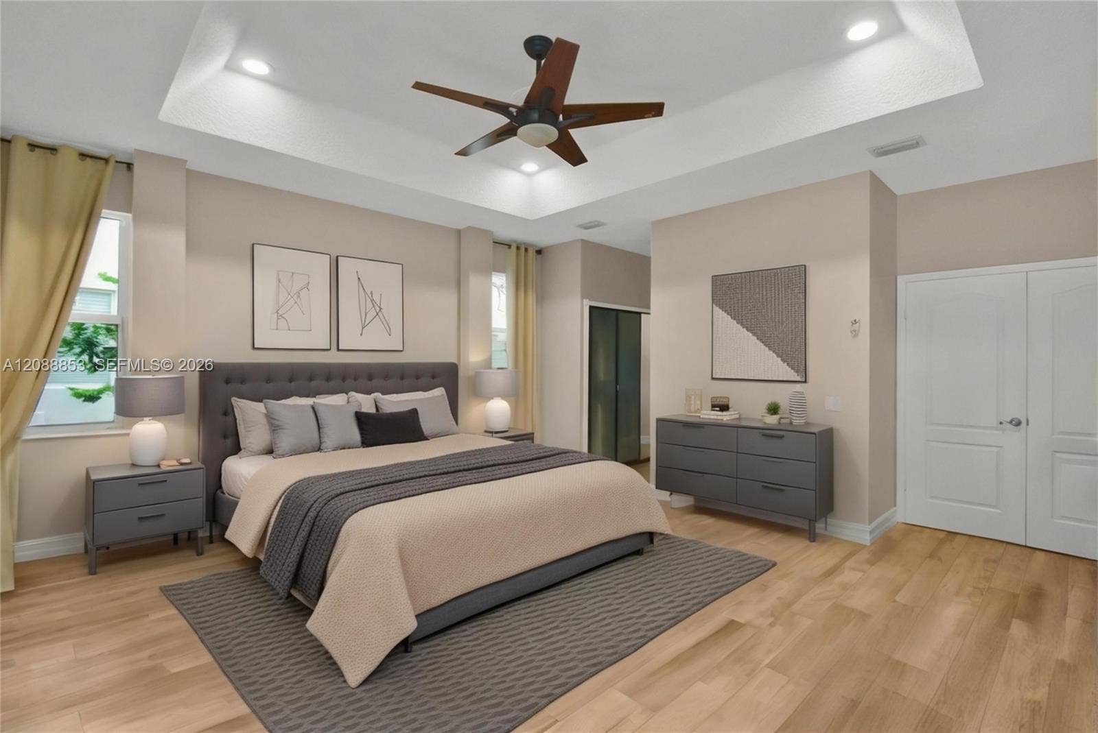 523 Stonemont Drive, Weston, FL 33326 Virtual staging. Spacious primary bedroom with views of the patio