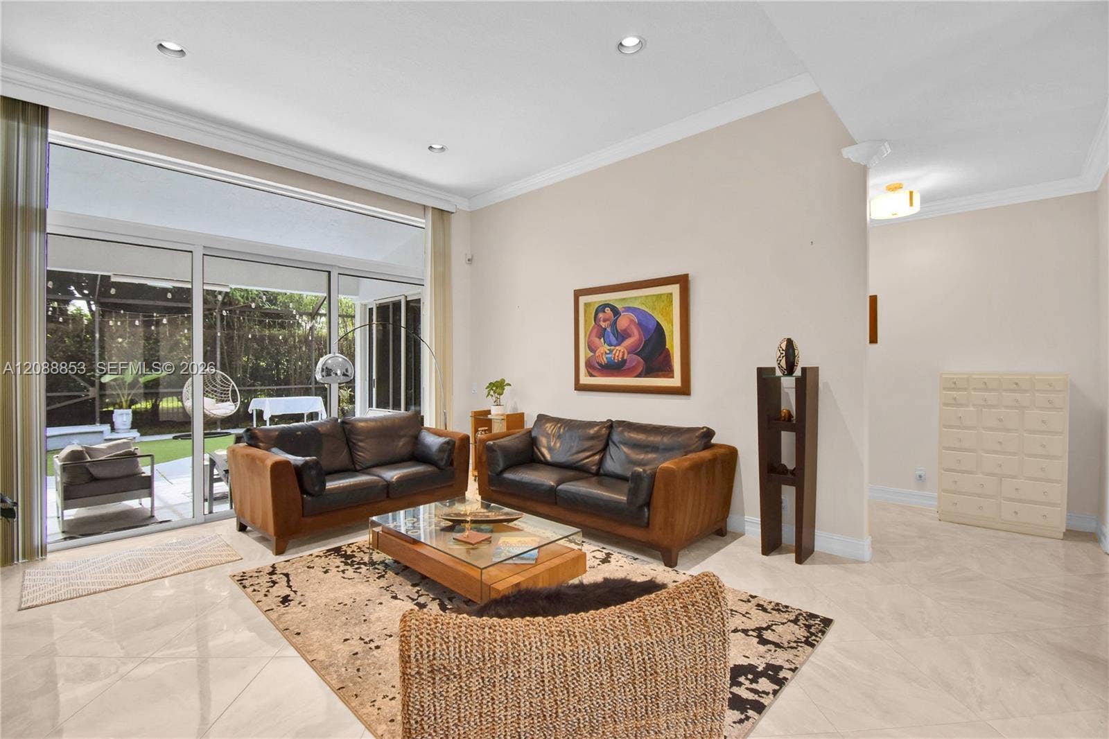 523 Stonemont Drive, Weston, FL 33326 Full impact doors. Spacious living room with natural light and open layout