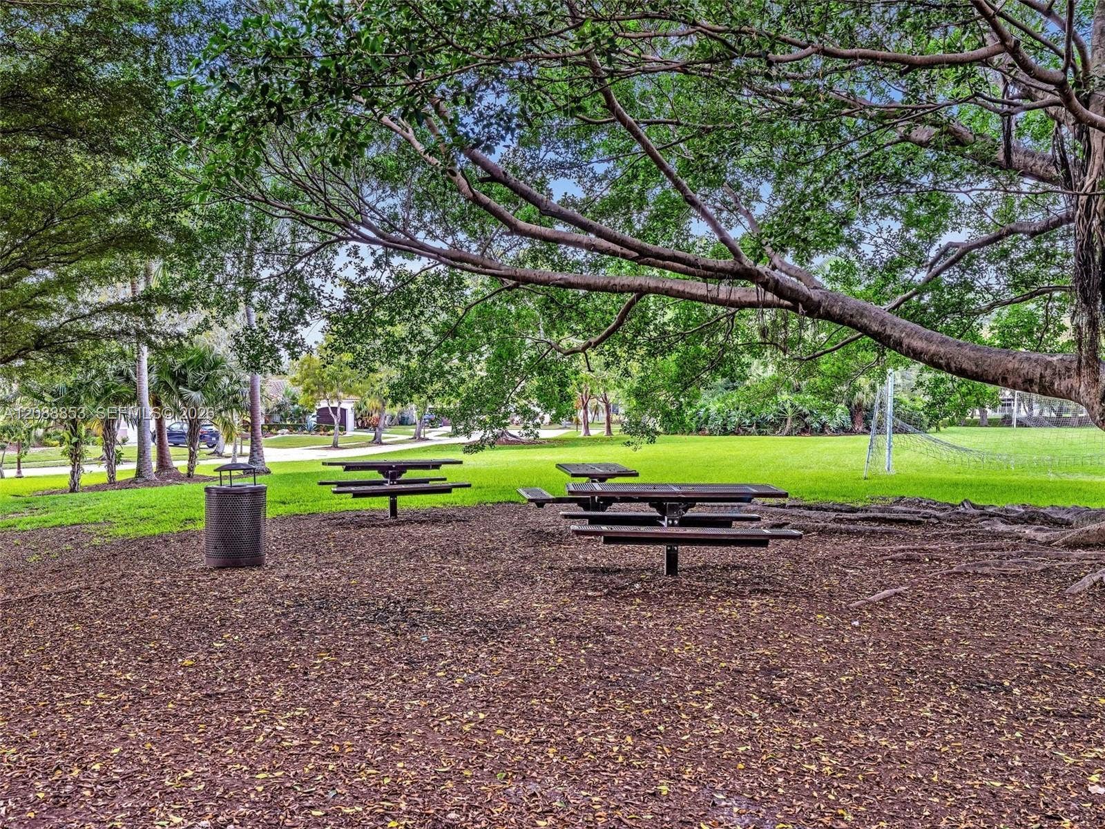 523 Stonemont Drive, Weston, FL 33326 Expansive green space with soccer field, ideal for recreation and events