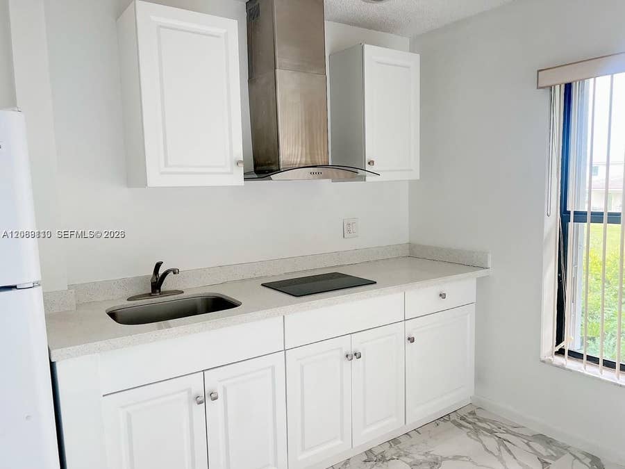 Property photo for 1440 NW 45th Street, #A1, Deerfield Beach, FL