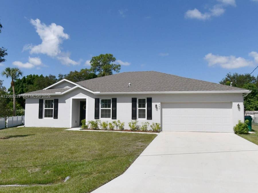 Property photo for 702 SW Aster Road, Port St Lucie, FL