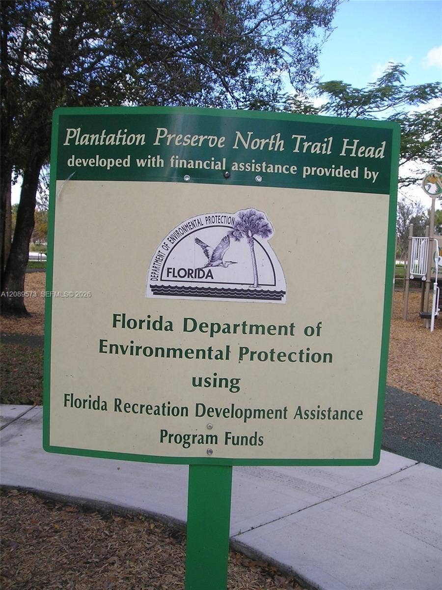 Beautiful walking trails and park next door to community.