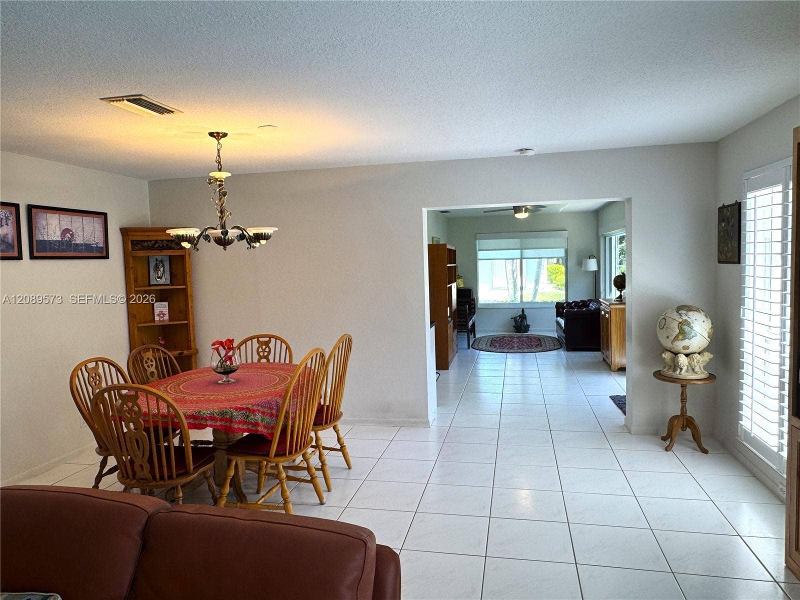 Open Concept Plan! Living Room is open to Dining Room, and open to large den/family room! Custom window treatments throughout home!