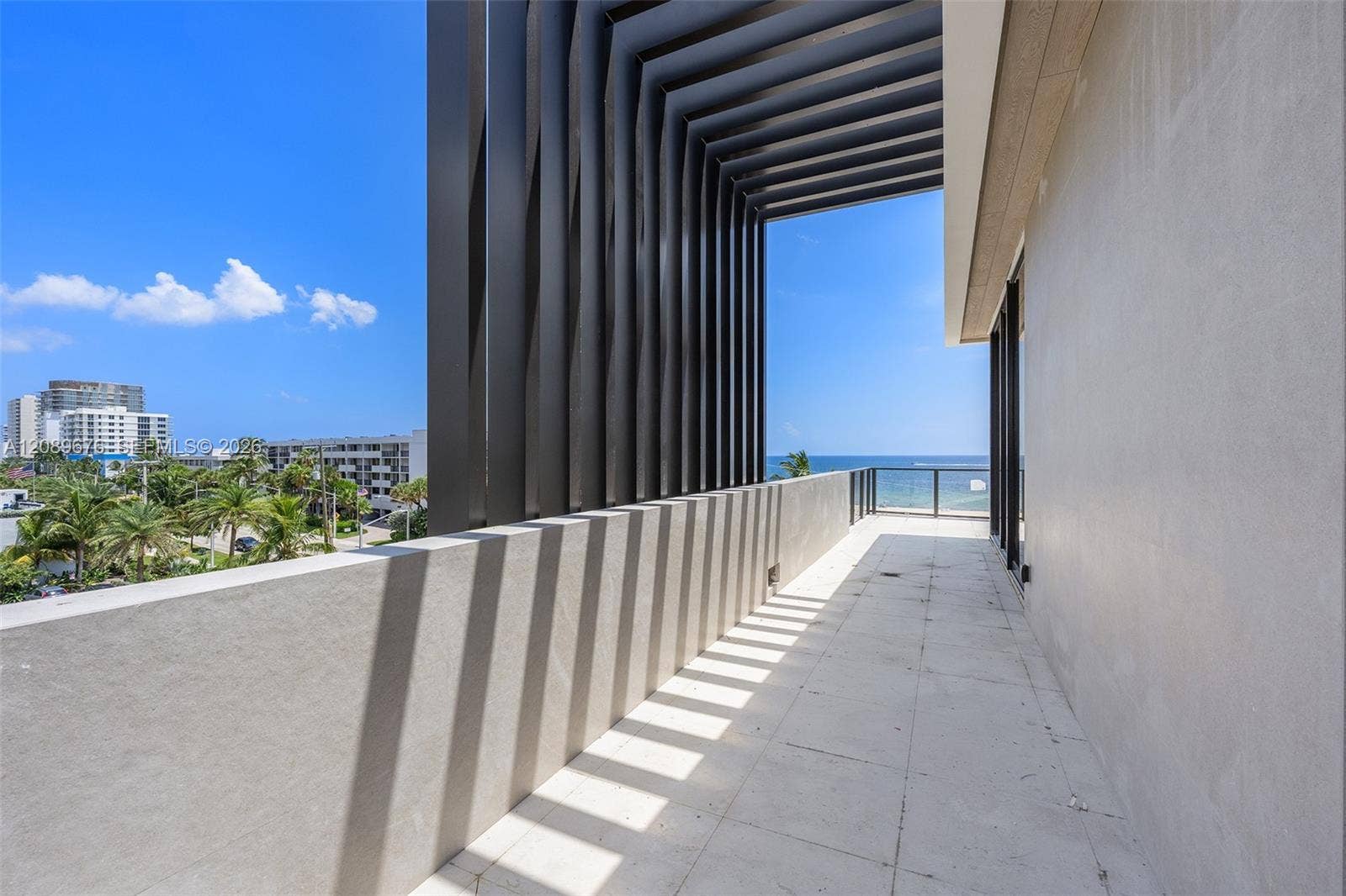 497 N Ocean Boulevard, #1, Pompano Beach, FL 33062 Louvered pergola, fourth-floor terrace.