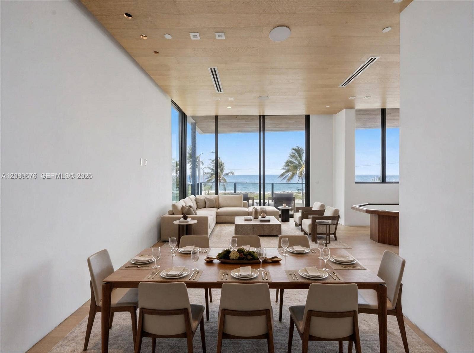 497 N Ocean Boulevard, #1, Pompano Beach, FL 33062 Rendering, virtually staged. Dining and living, second floor.