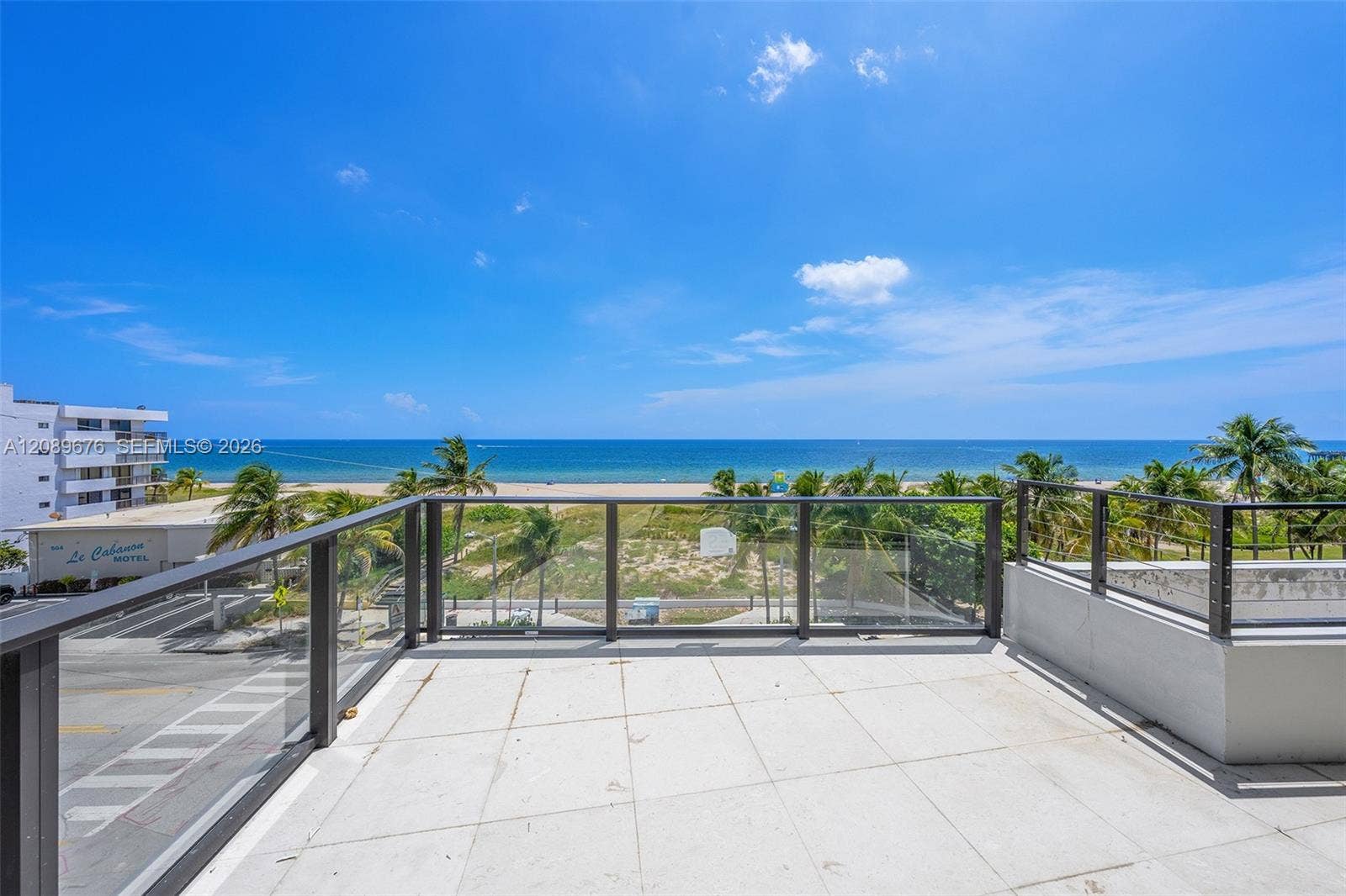 497 N Ocean Boulevard, #1, Pompano Beach, FL 33062 Fourth-floor terrace, ocean view.