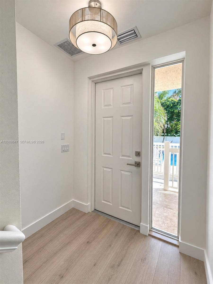 ENTRY IN FRONT OF POOL (1ST FLOOR)
