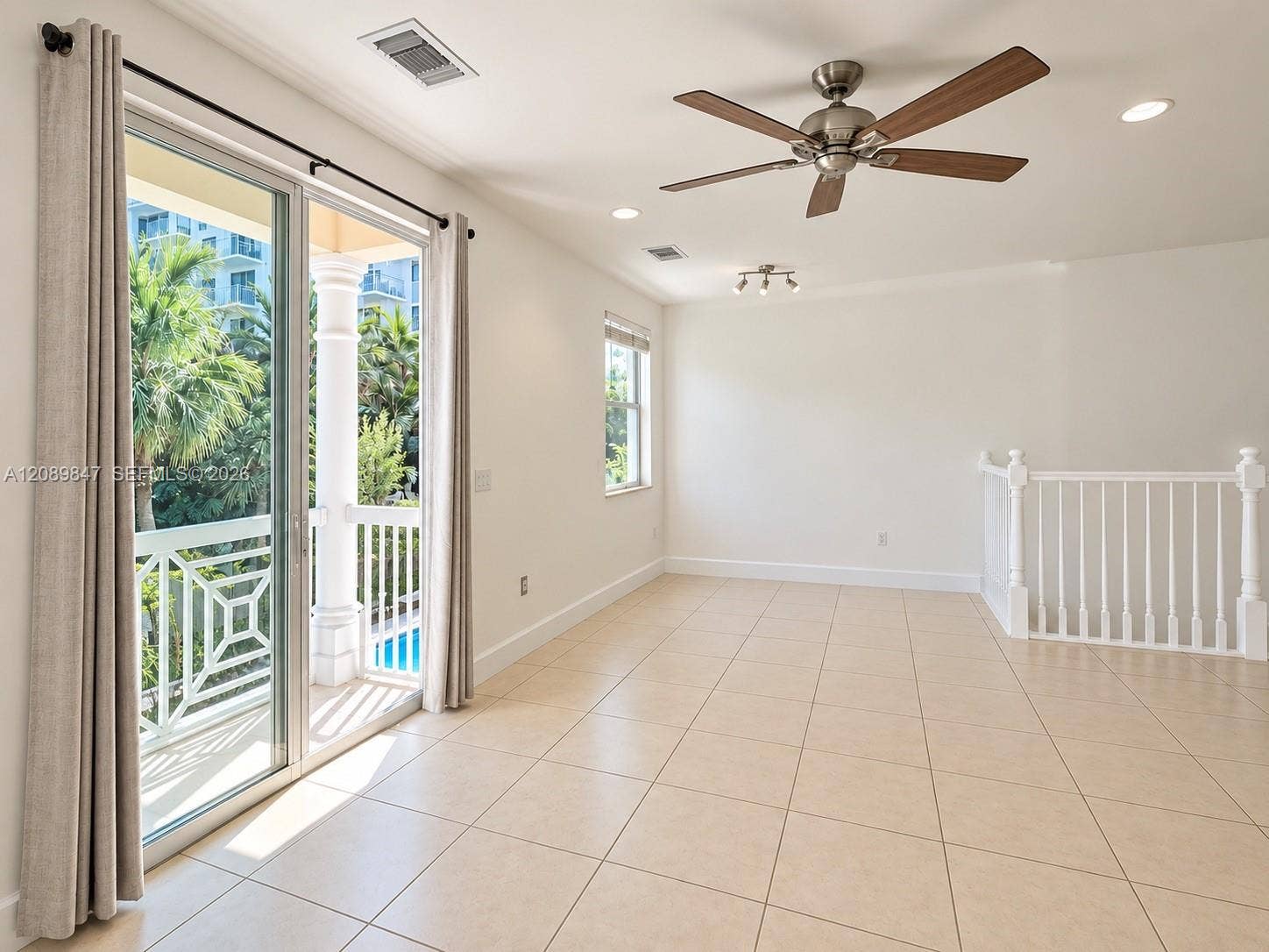 POOL VIEW FROM LIVING ROOM (2ND FLOOR)