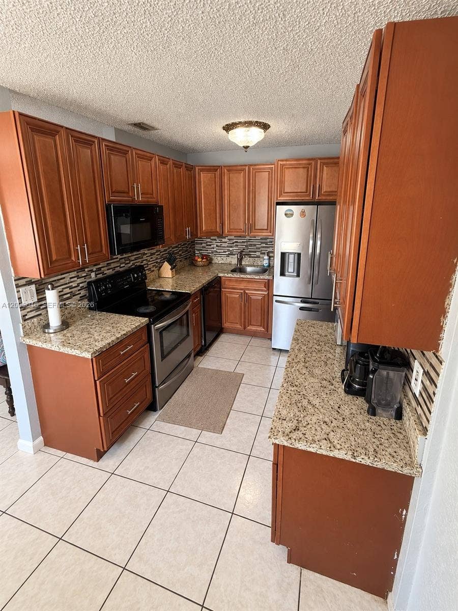 Property photo for 5871 NW 41st Terrace, North Lauderdale, FL