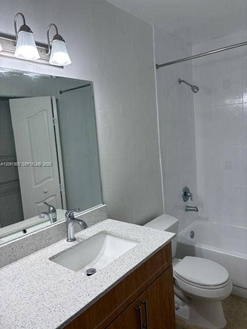 18356 NW 68th Avenue, #E, Hialeah, Hialeah, FL 33015 Bathroom featuring a vanity with stone-composite countertop, integrated rectangular sink, wood-finish cabinetry, dual-light wall sconce, and a shower-tub combination with white tile surround