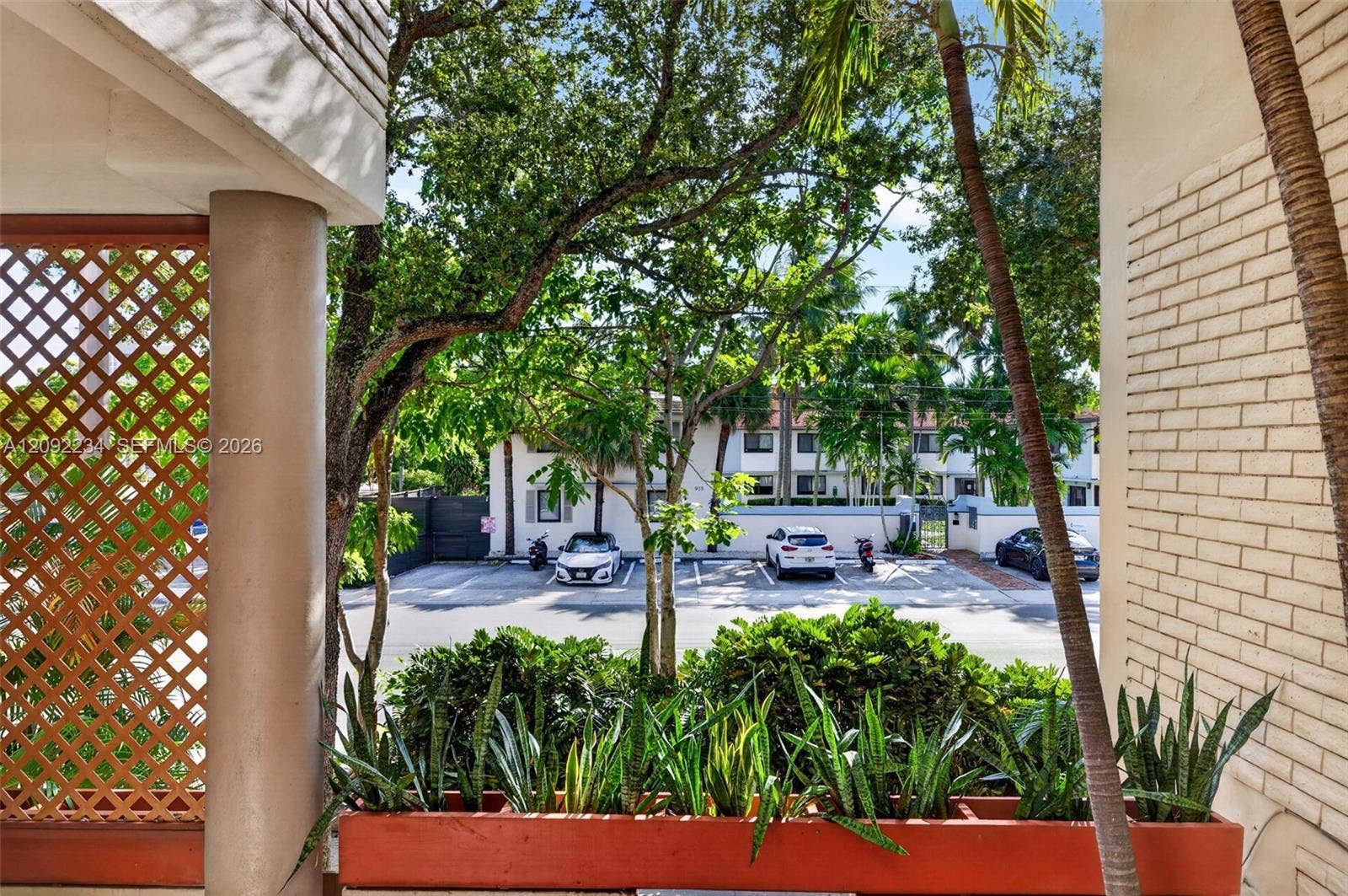 1401 NE 9th Street, #50, Fort Lauderdale, FL 33304 Exterior Wall Mounted Plant Containers with Easy to Care for Snake Plants
