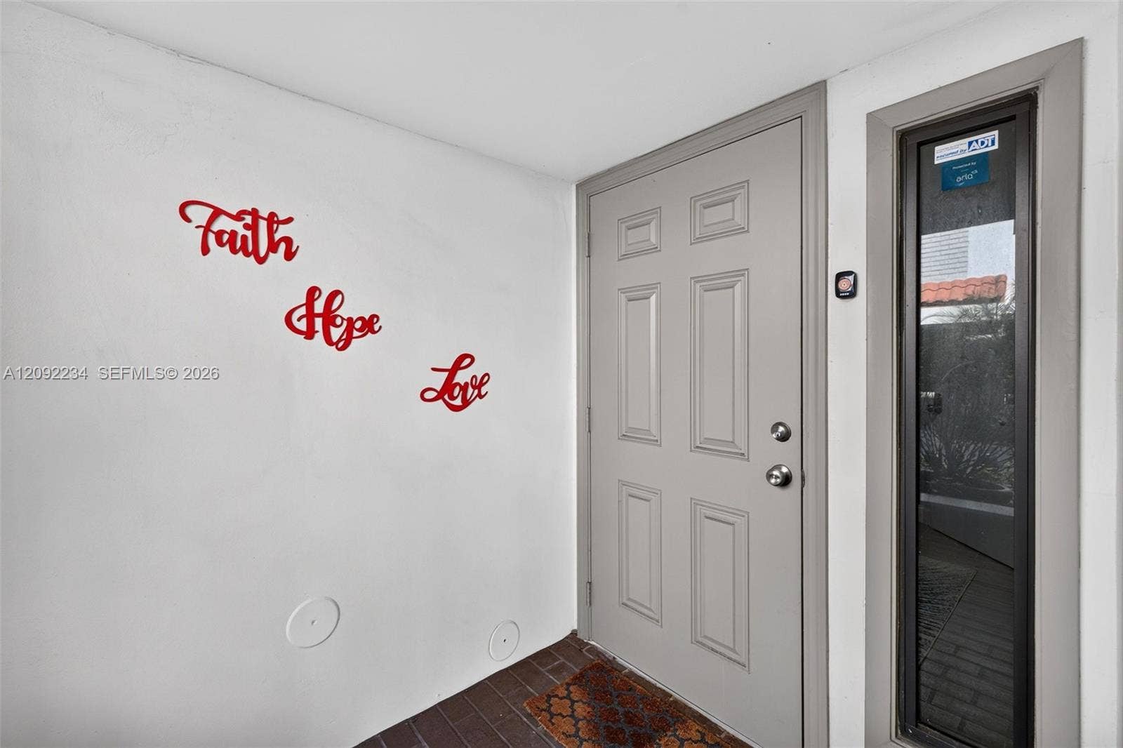1401 NE 9th Street, #50, Fort Lauderdale, FL 33304 Hurricane Impact Front Entry Door and Sidelight Offer Added Safety