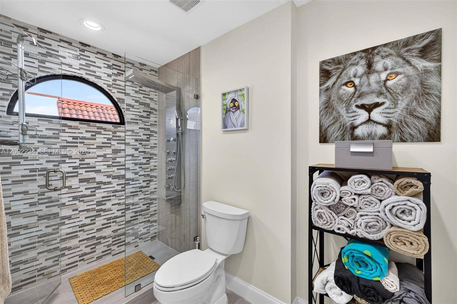1401 NE 9th Street, #50, Fort Lauderdale, FL 33304 Gorgeous Tile Work the Master Bathroom Illuminated by the Skylight Above the Master Bathroom