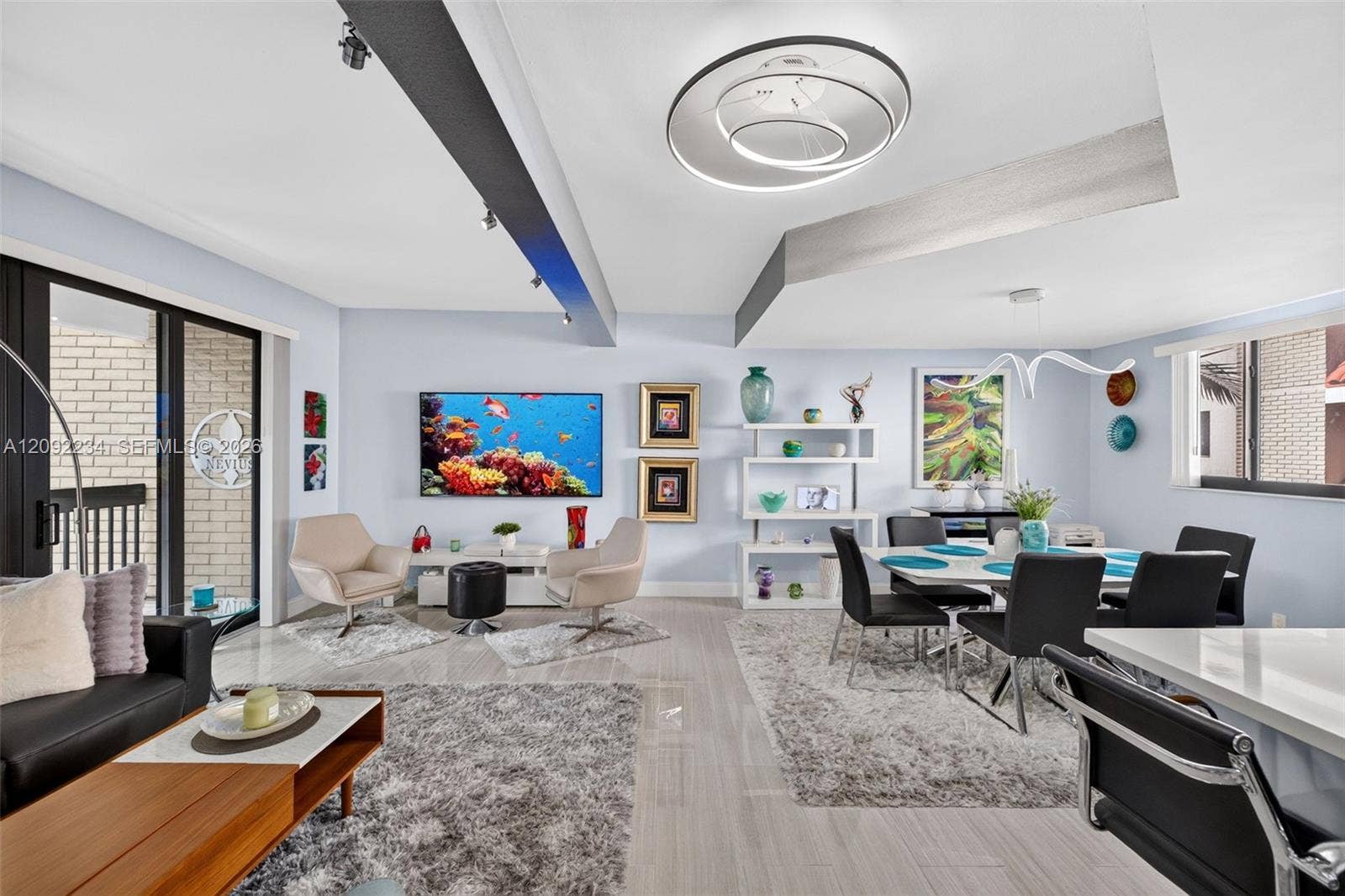 1401 NE 9th Street, #50, Fort Lauderdale, FL 33304 Faux Metal Ceiling Details Gives the Living Space a Sleek Contemporary Look