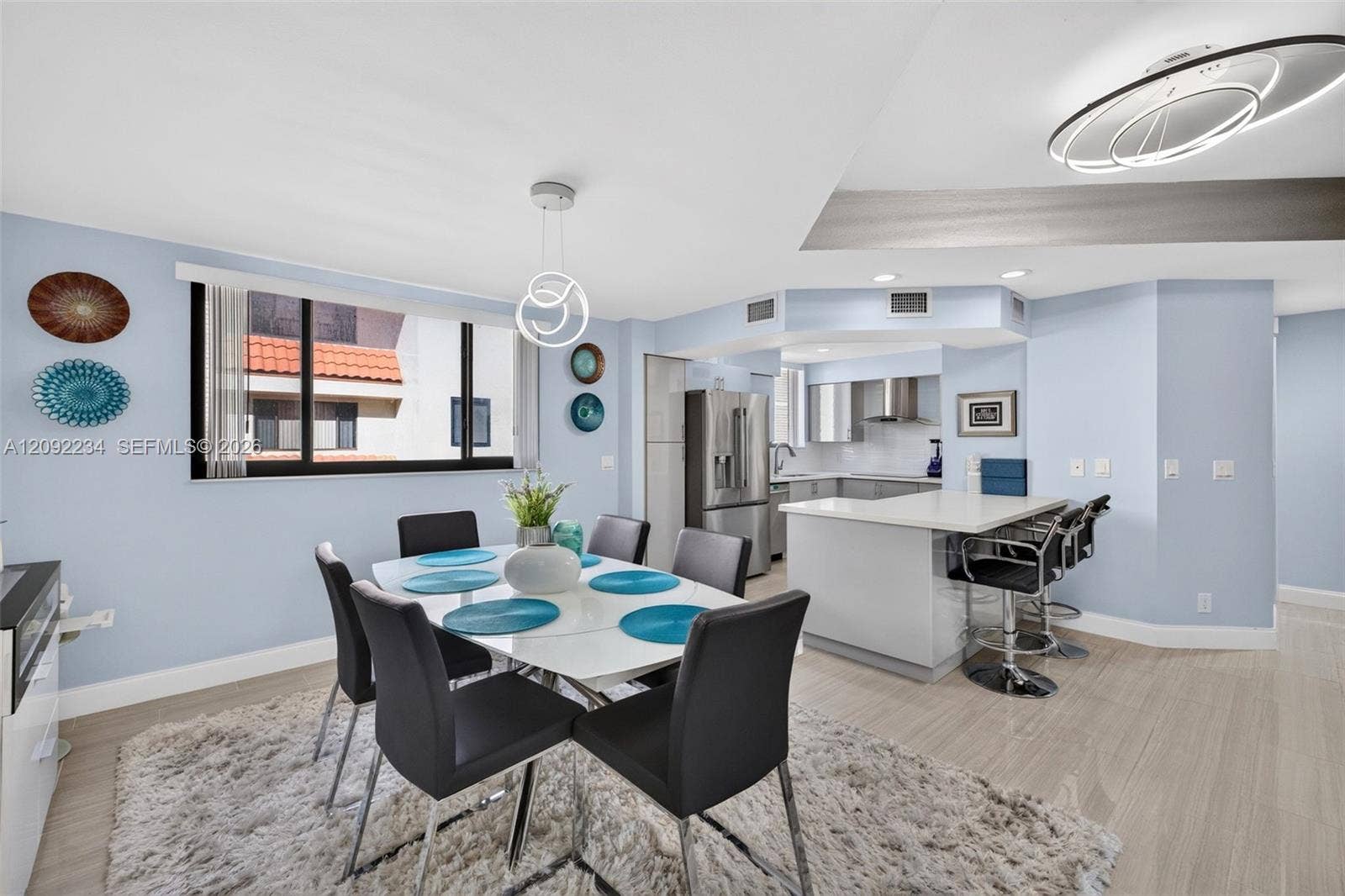 1401 NE 9th Street, #50, Fort Lauderdale, FL 33304 Dining Area Flows Effortlessly into the Kitchen