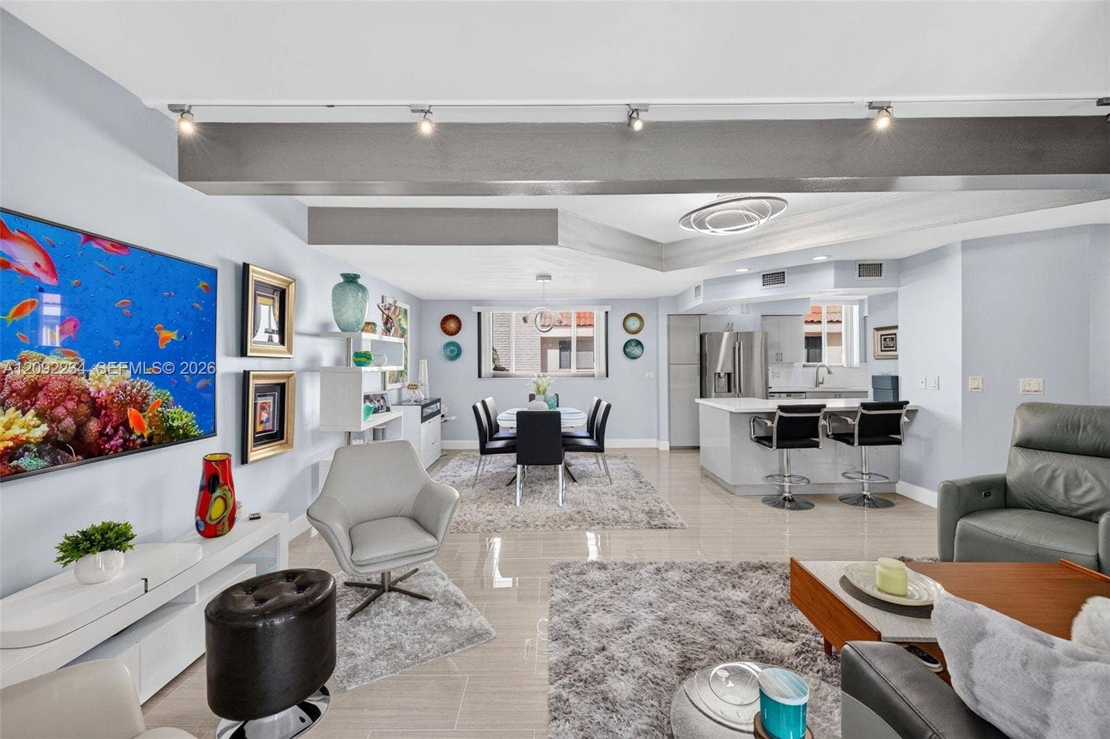 1401 NE 9th Street, #50, Fort Lauderdale, FL 33304 Modern Lighting Fixtures Highlight the Faux Metal Details