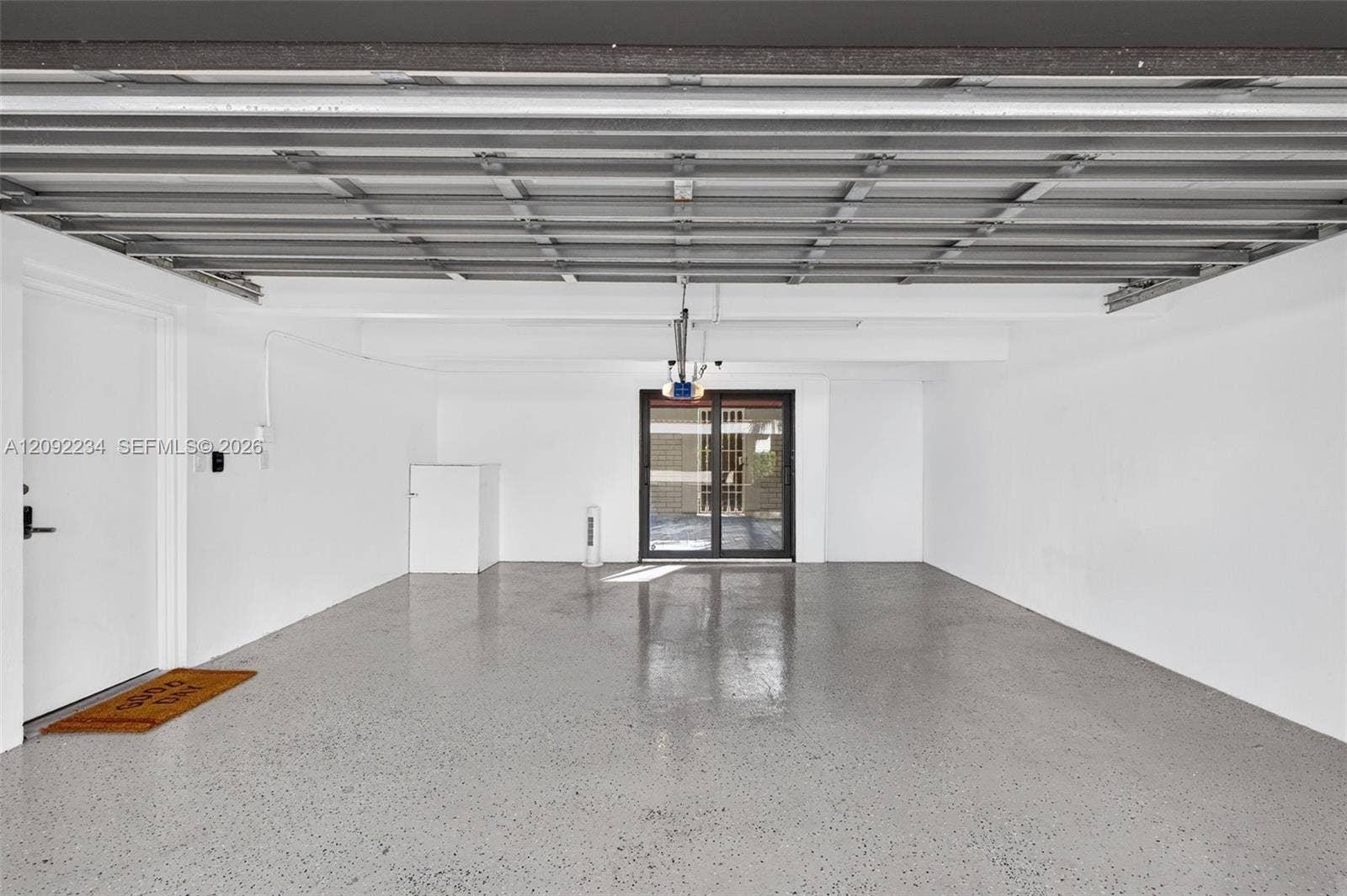1401 NE 9th Street, #50, Fort Lauderdale, FL 33304 New Epoxy Sealed Faux Granite Finish Garage Floor
