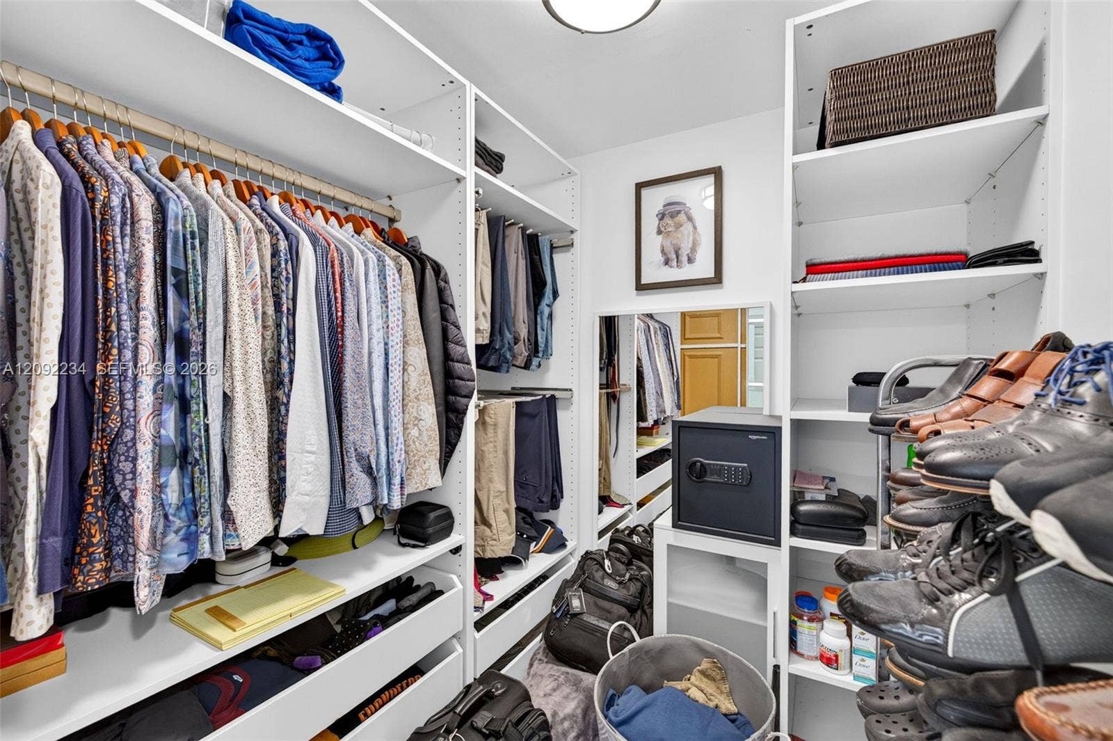 1401 NE 9th Street, #50, Fort Lauderdale, FL 33304 Built In Cabinets in the Master Suite Main Closet