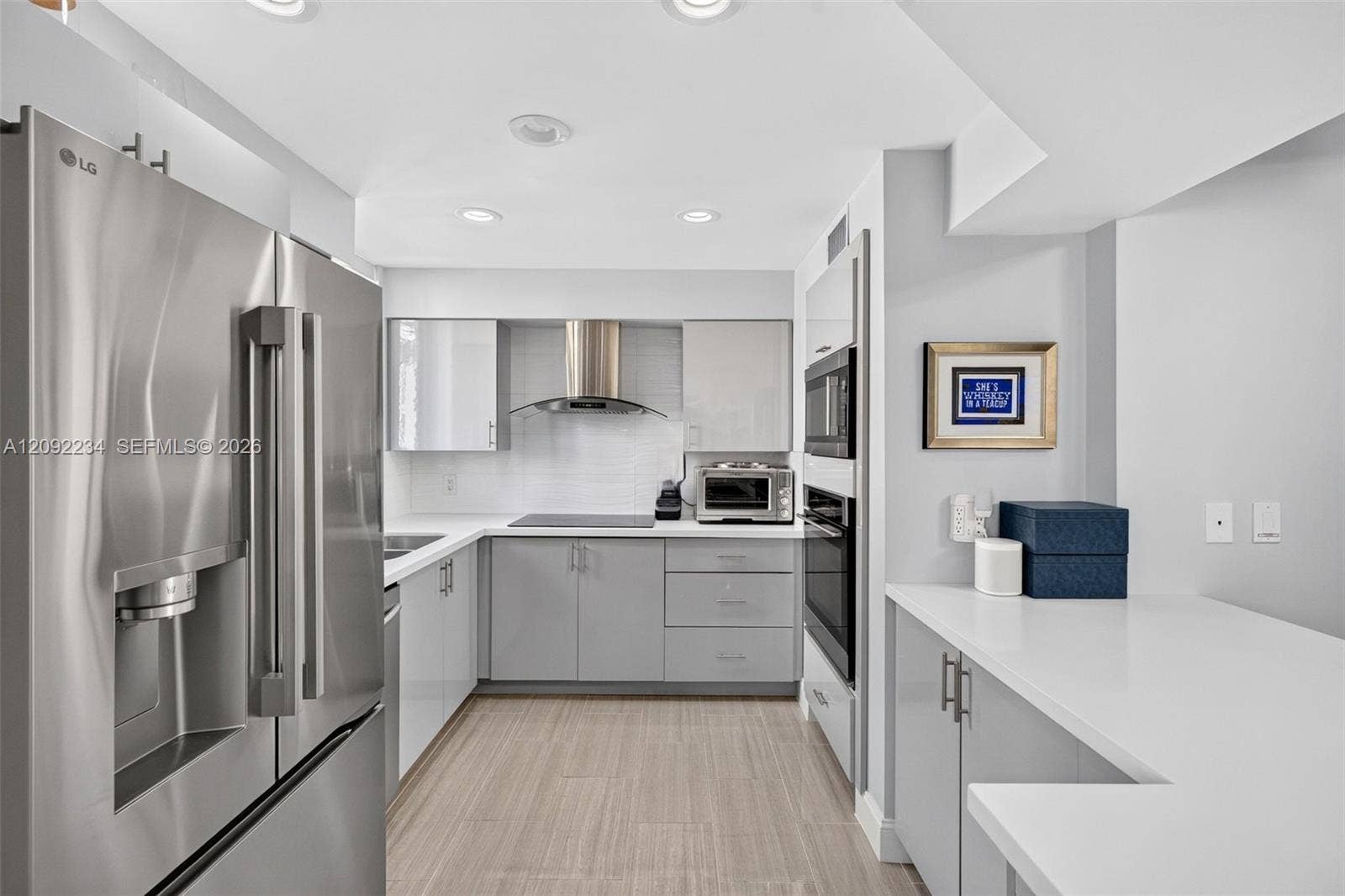 1401 NE 9th Street, #50, Fort Lauderdale, FL 33304 Desirable Muted Monochromatic Gray and Stainless Steel Combination