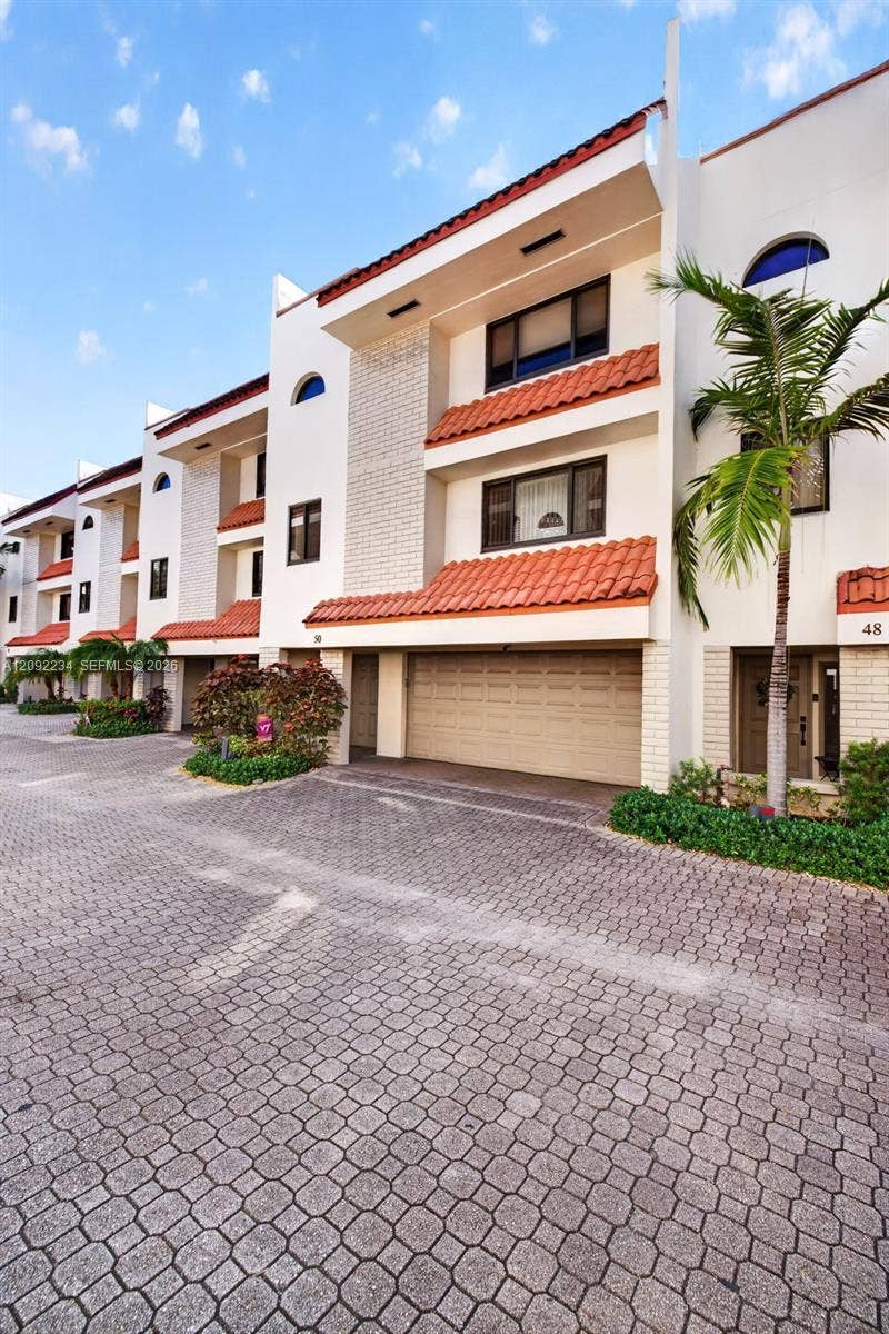 1401 NE 9th Street, #50, Fort Lauderdale, FL 33304 Traditional Terra Cota Barrel Tile Accents Gives the Complex a Classic Florida Look