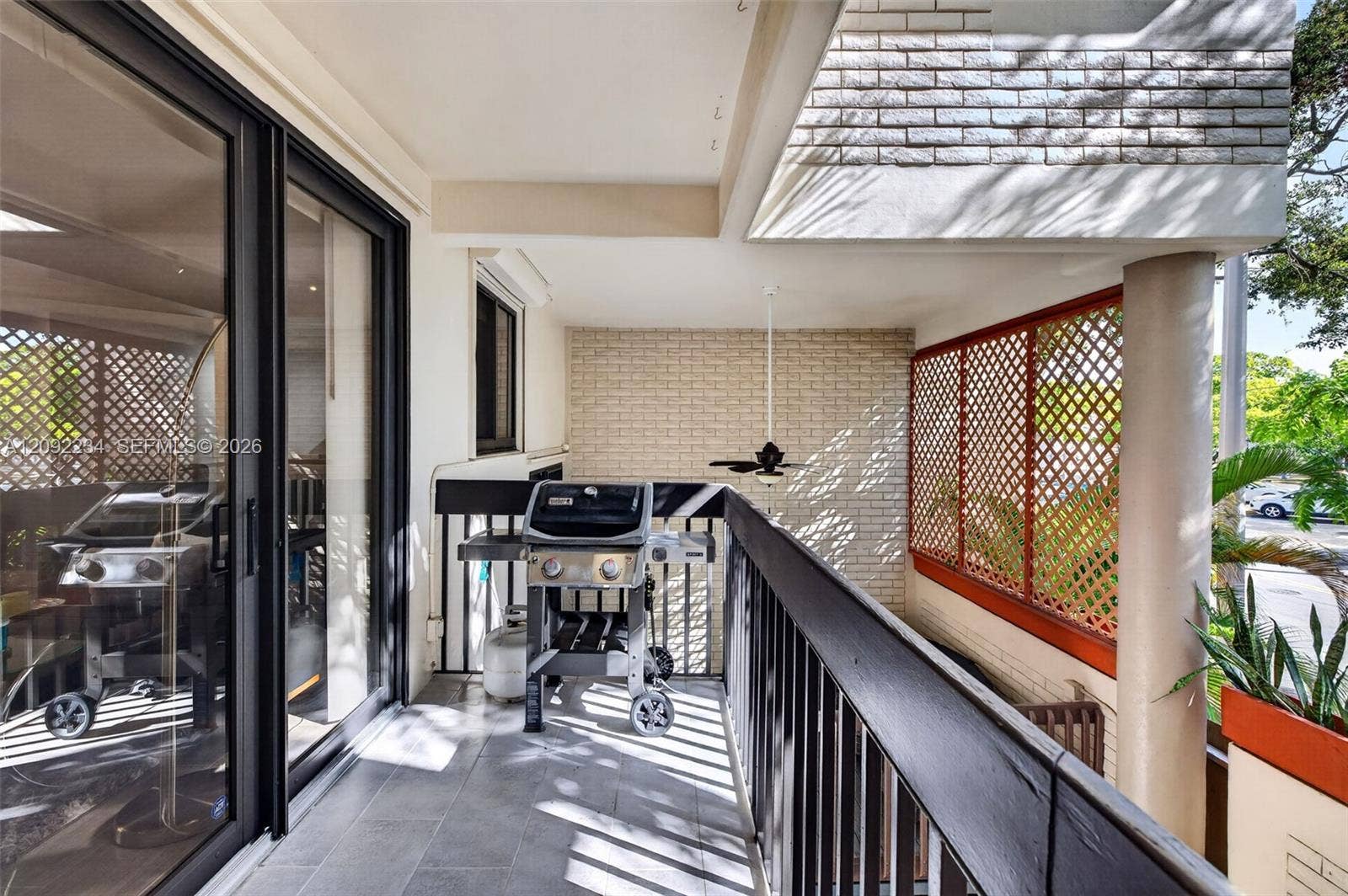 1401 NE 9th Street, #50, Fort Lauderdale, FL 33304 Enter the Second Floor Balcony from the Living Room Impact Sliding Doors