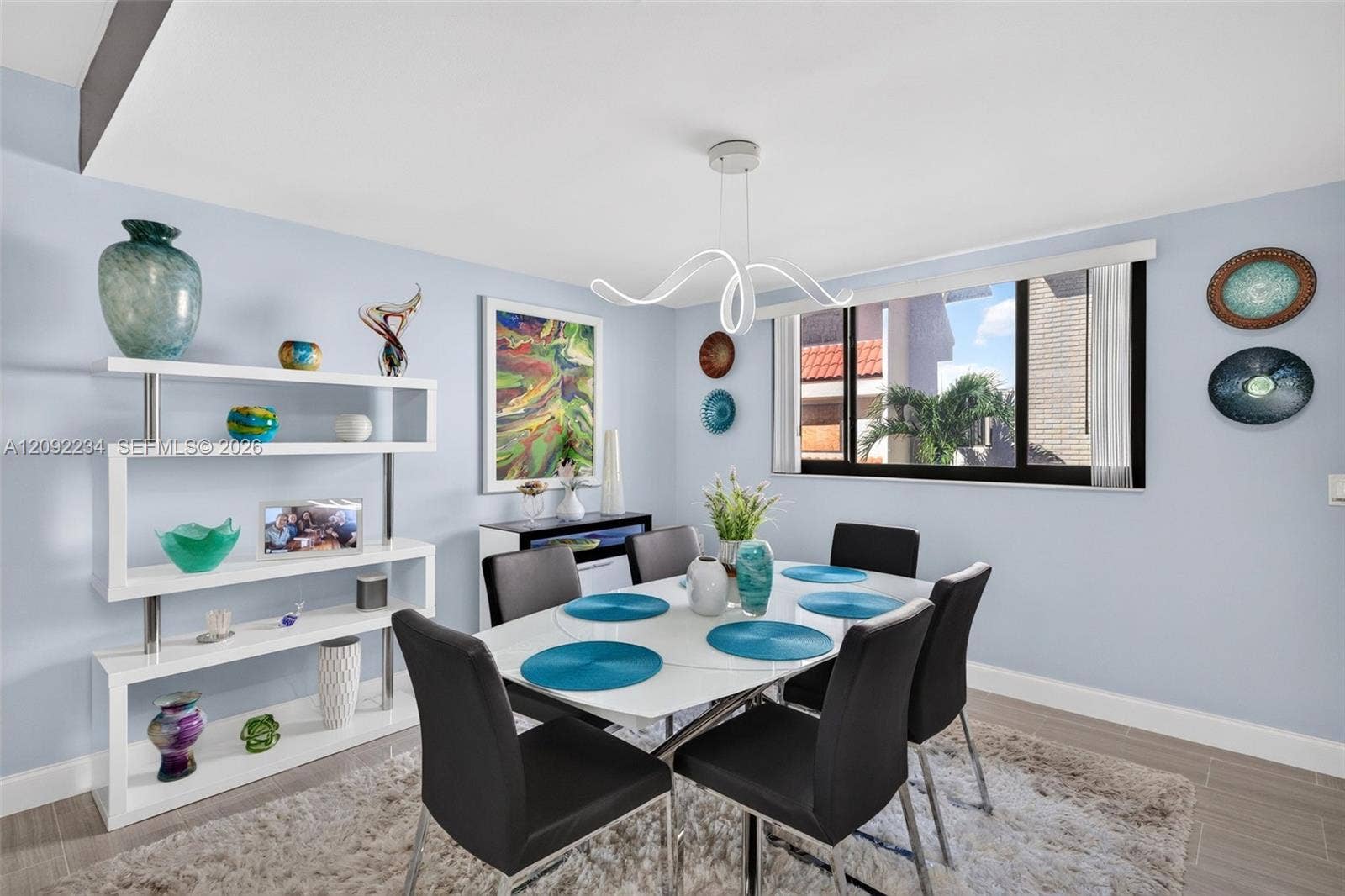 1401 NE 9th Street, #50, Fort Lauderdale, FL 33304 Impact Glass Window in the Dining Room also Allows for a Screened Cross Breeze in the Winter When the Temperatures Drop