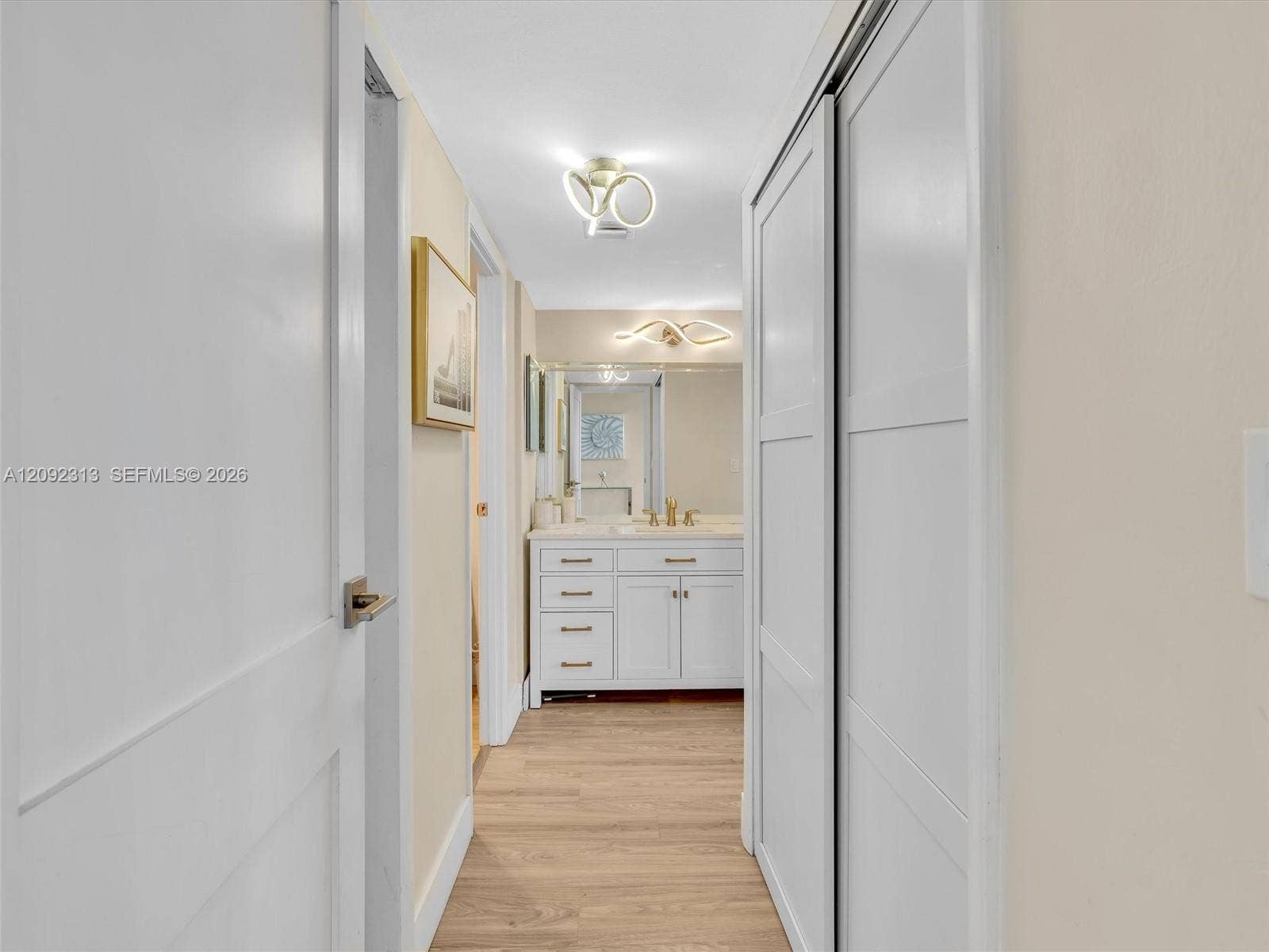 20301 W Country Club Drive, #622, Aventura, FL 33180 Hallway leading to the primary suite with custom built-in closets and private bathroom