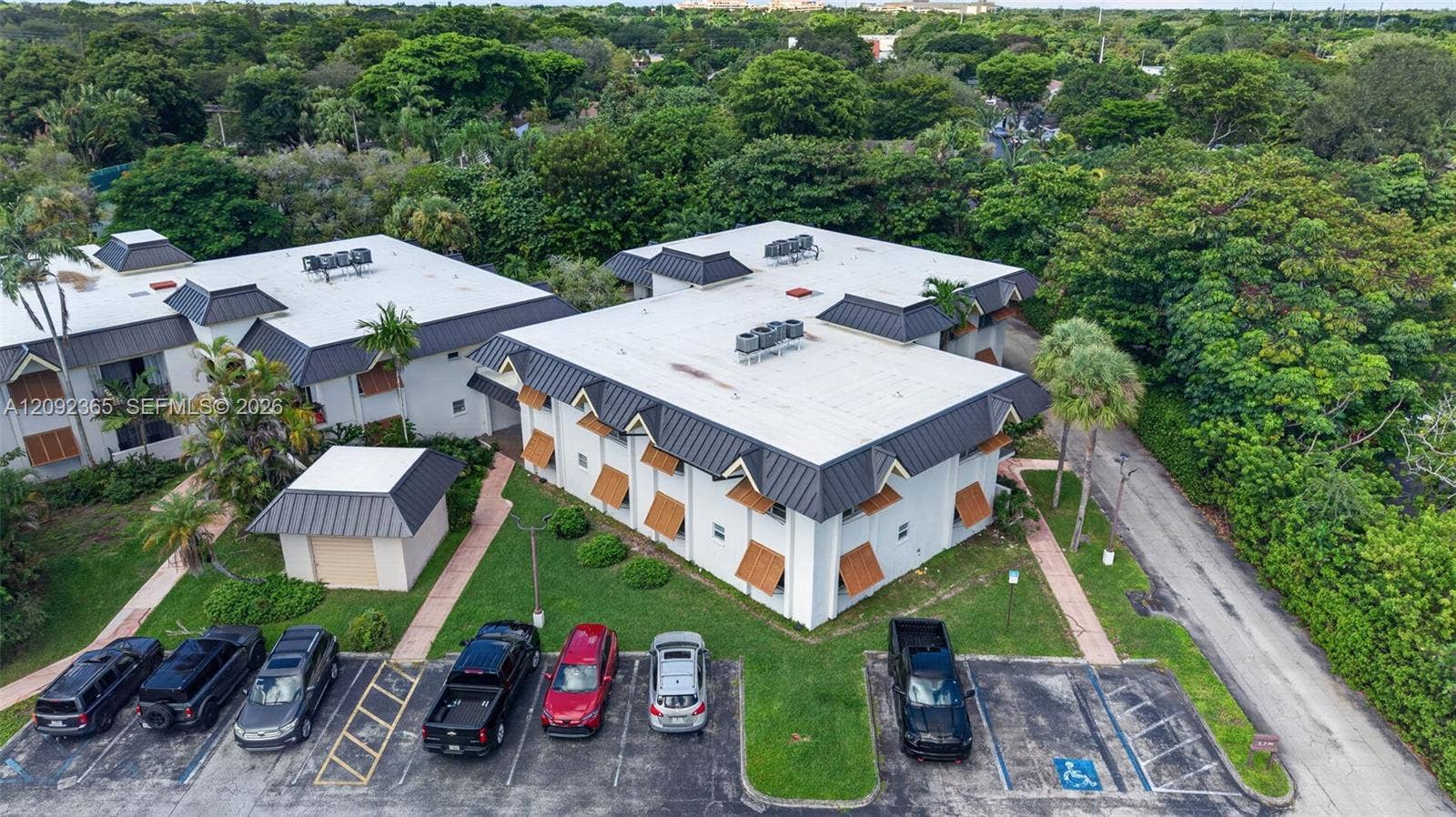 9356 SW 77th Avenue, #J7, Miami, FL 33156 Building has new roof.