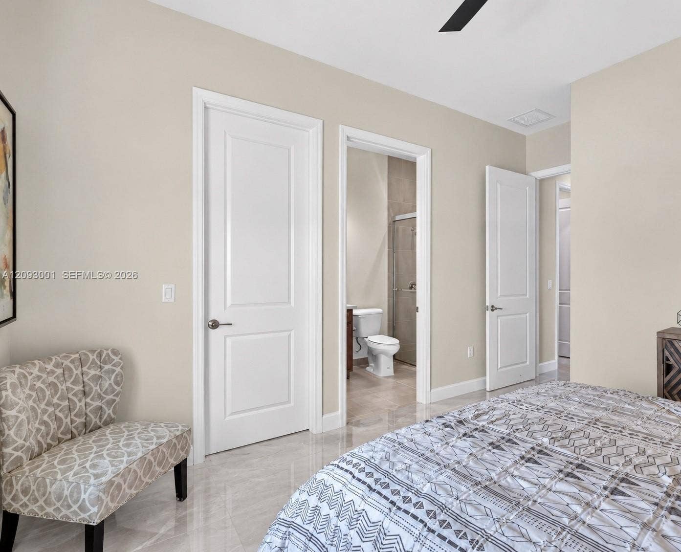 12688 SW Palmer Road, Port St Lucie, FL 34987 Polished tile flooring, two-panel interior doors with brushed nickel hardware, and recessed ceiling lighting