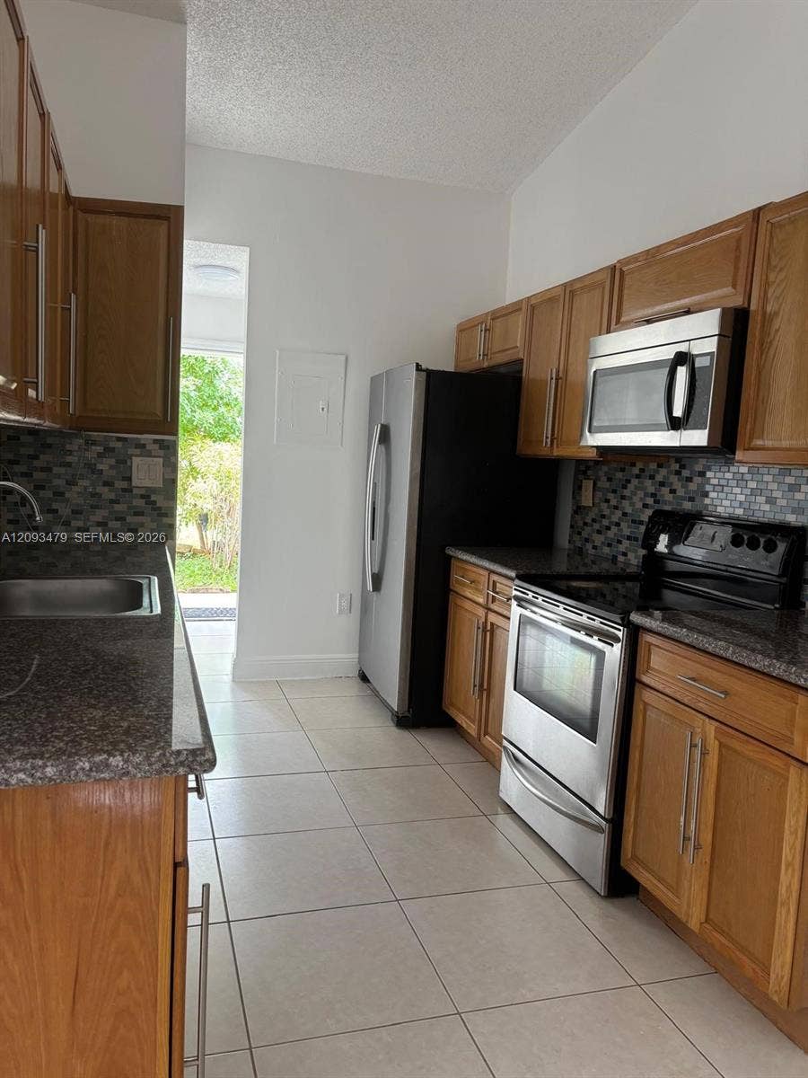 Property photo for 815 NE 213th Terrace, #815-04, Miami, FL