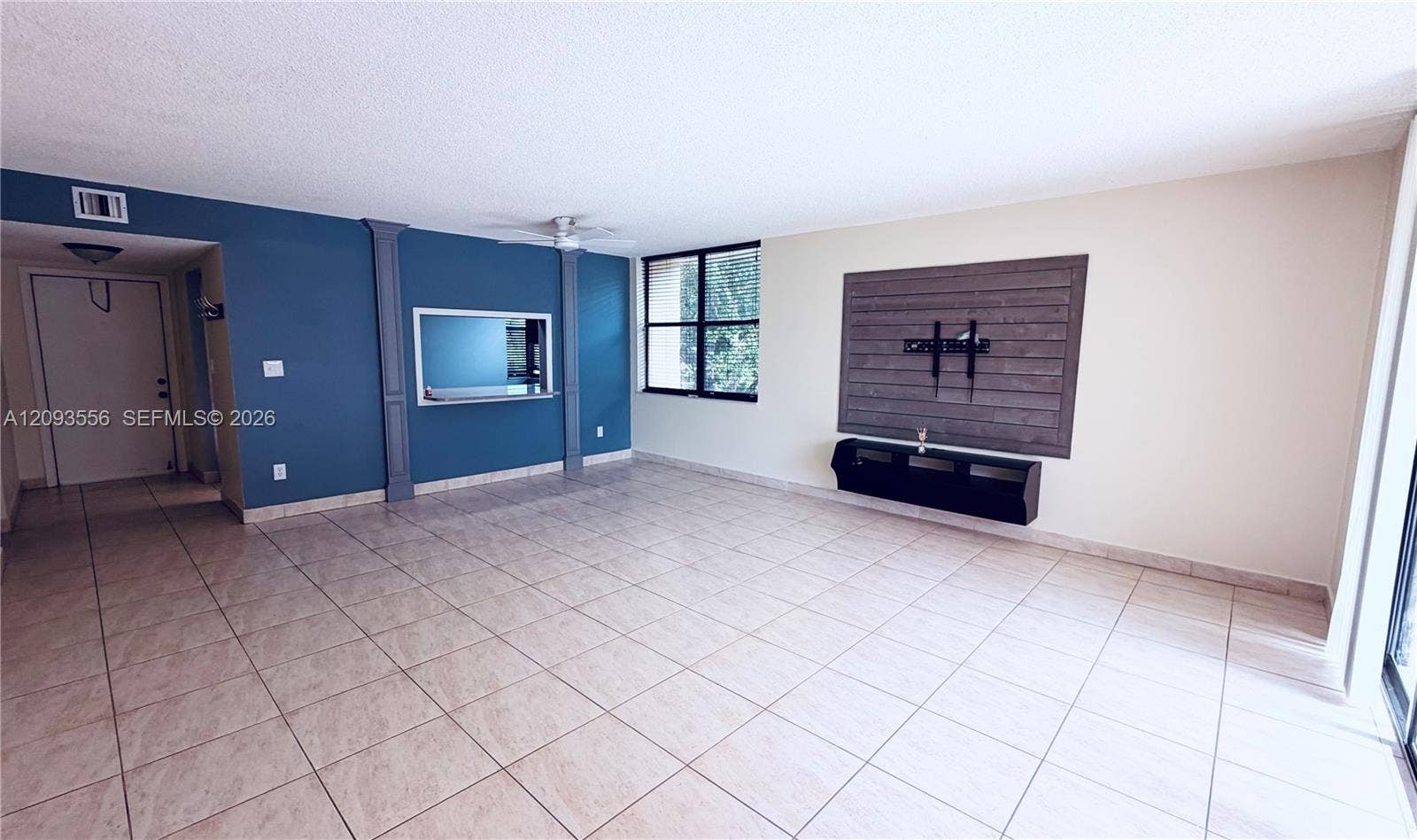 6800 Cypress Road, #401, Plantation, Plantation, FL 33317 With dining and TV areas