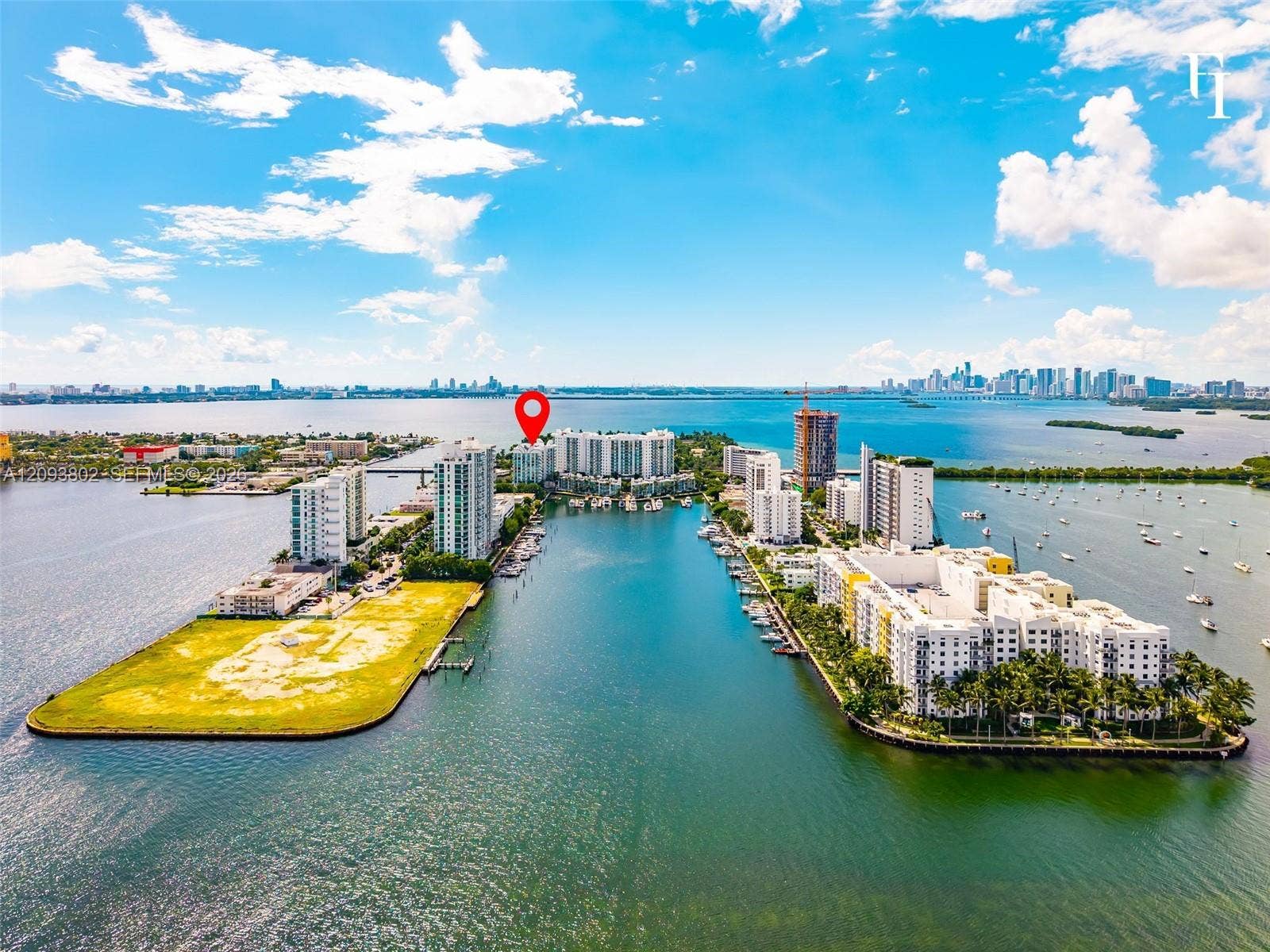 7910 Harbor Island Drive, #909, North Bay Village, North Bay Village, FL 33141 Waterfront mid-rise building featuring boat slips, direct harbor access, and a peninsula-style location