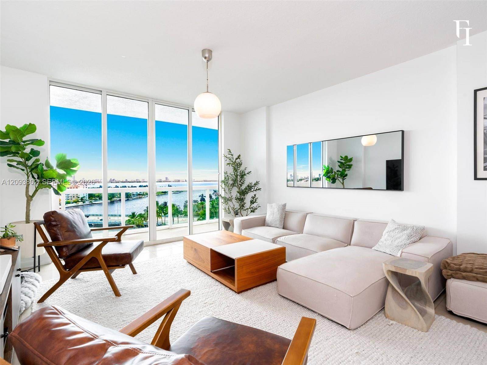 7910 Harbor Island Drive, #909, North Bay Village, North Bay Village, FL 33141 Floor-to-ceiling glass windows, exterior balcony with railing, pendant globe lighting, and polished flooring