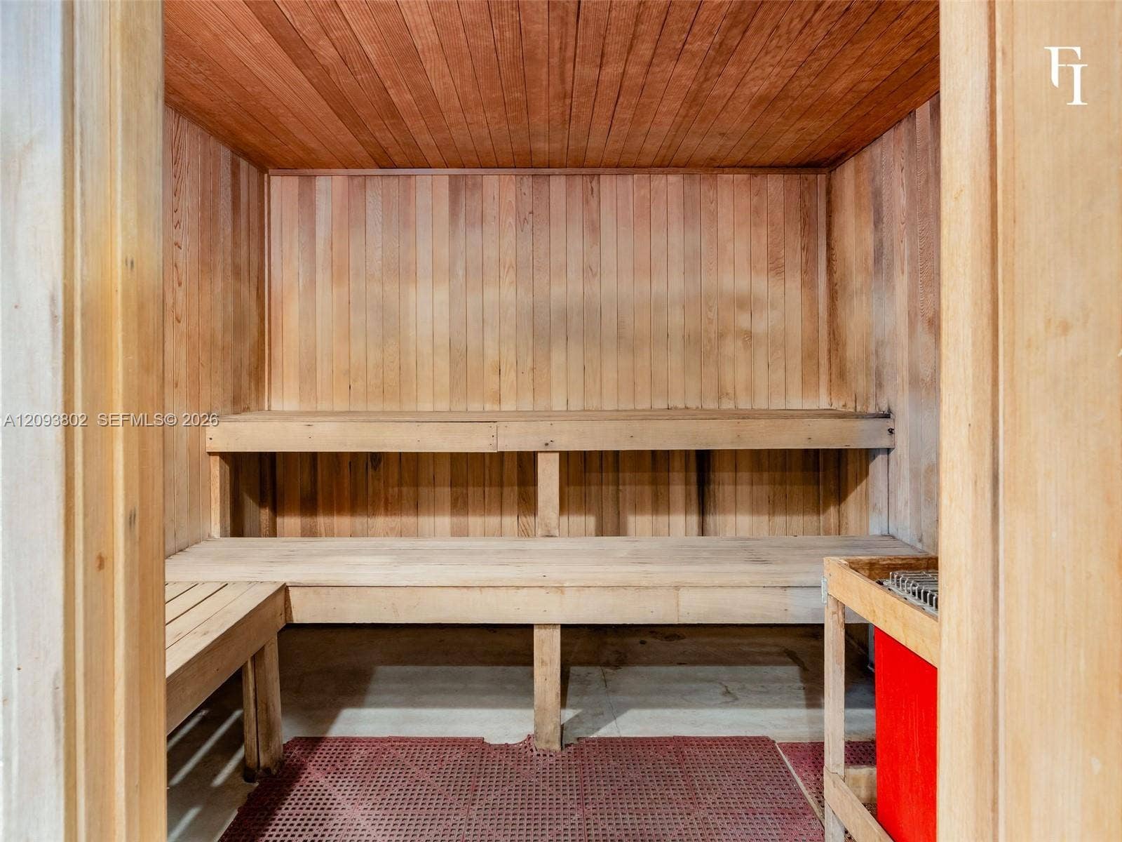 7910 Harbor Island Drive, #909, North Bay Village, North Bay Village, FL 33141 Sauna featuring tongue-and-groove wood paneling, multi-level built-in bench seating, and an integrated heating unit