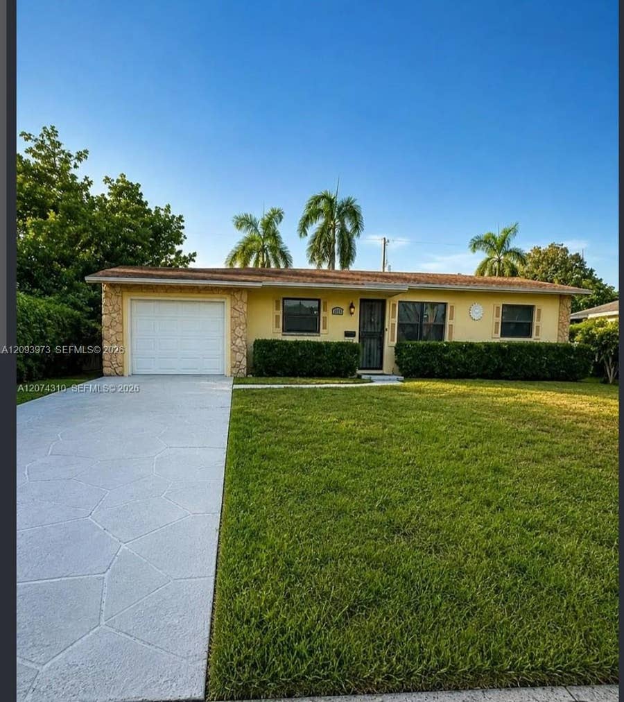Property photo for 539 Sabal Palm Drive, Lake Park, FL