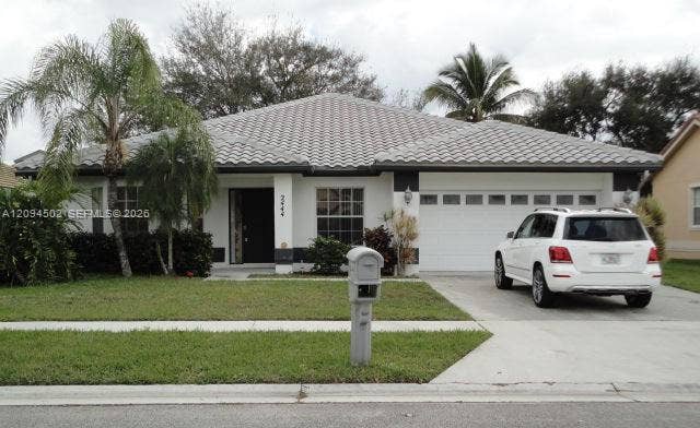 Property photo for 2444 Stonegate Drive, Wellington, FL