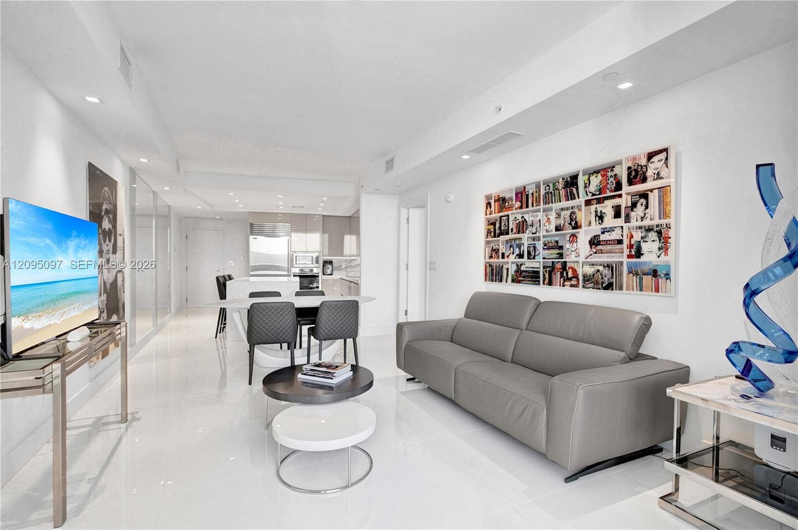 18201 Collins Avenue, #1407, Sunny Isles Beach, FL 33160 Polished tile flooring, recessed ceiling lighting, and sleek modern cabinetry