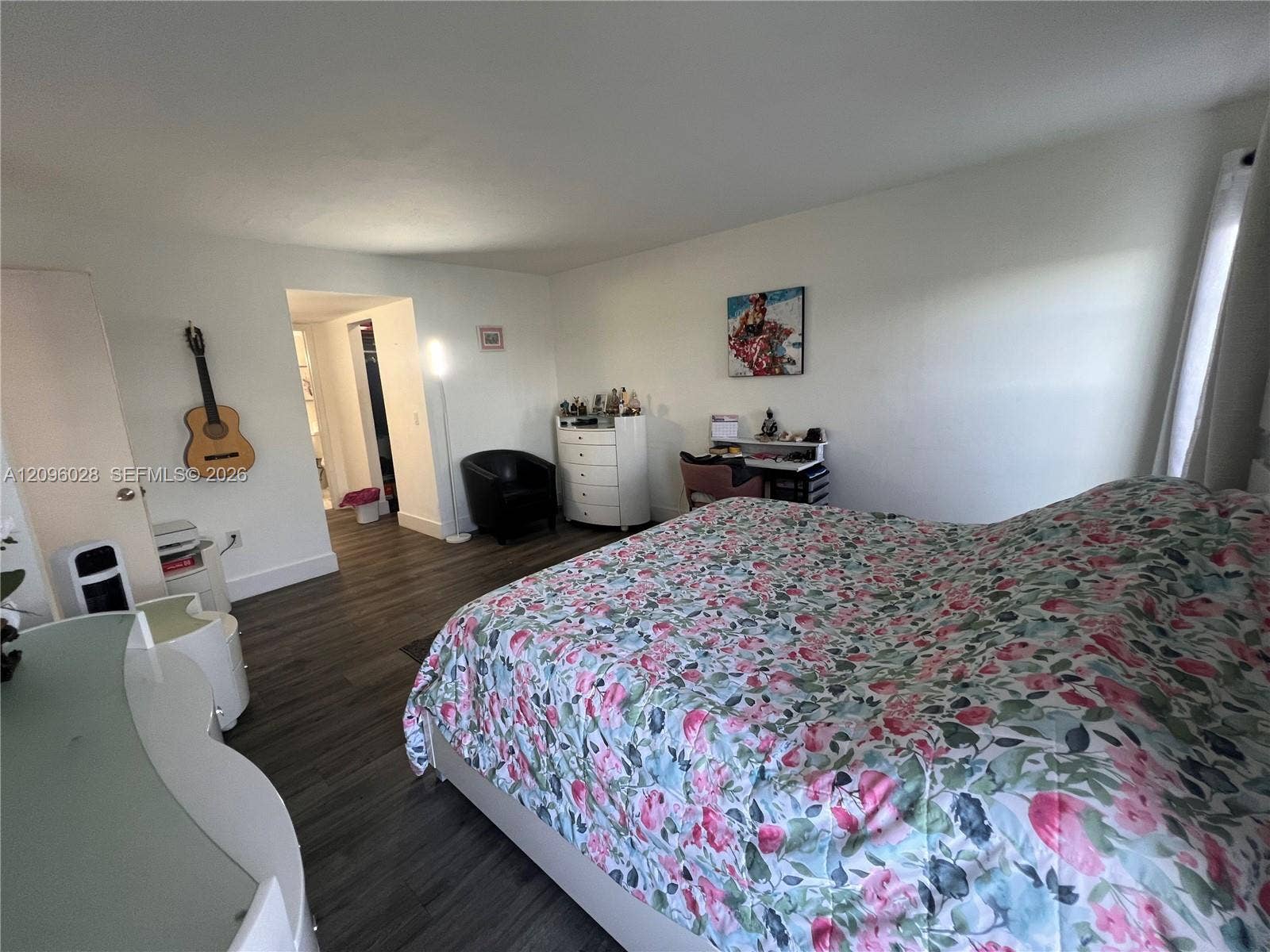 6300 SW 138th Court, #405, Miami, FL 33183 Interior room featuring wood-finish flooring and neutral wall paint