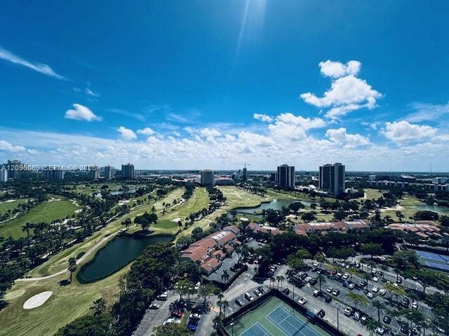 20355 NE 34th Court, #1925, Aventura, FL 33180 Aerial perspective featuring a golf course, expansive water features, and tennis courts