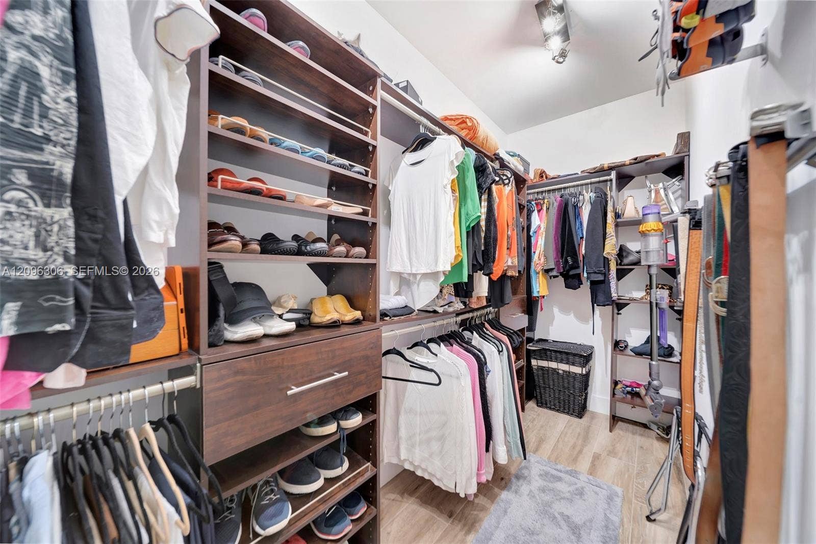 508 SE 1st Circle, Pompano Beach, FL 33060 Primary bedroom walk-in closet with custom installation