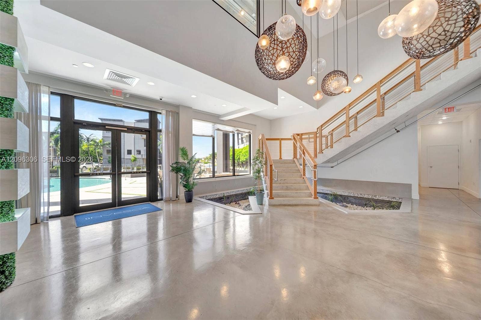 508 SE 1st Circle, Pompano Beach, FL 33060 Clubhouse with stairs leading to the 2nd floor gym