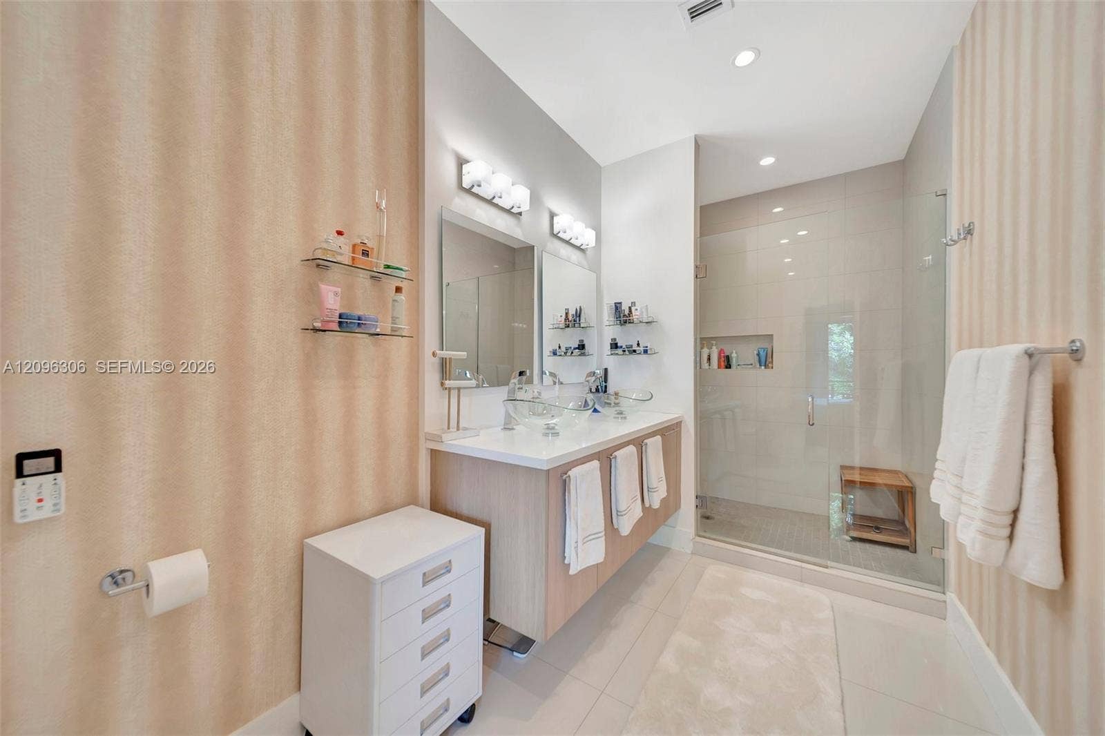 508 SE 1st Circle, Pompano Beach, FL 33060 Primary bathroom with dual, vessel sinks, floating vanity and large walk-in shower