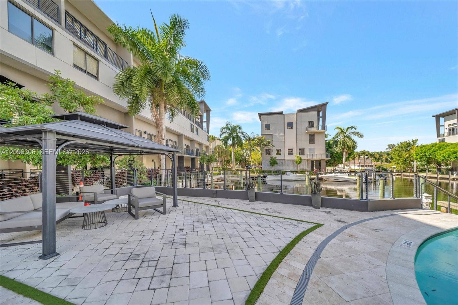 508 SE 1st Circle, Pompano Beach, FL 33060 Covered patio area at community pool